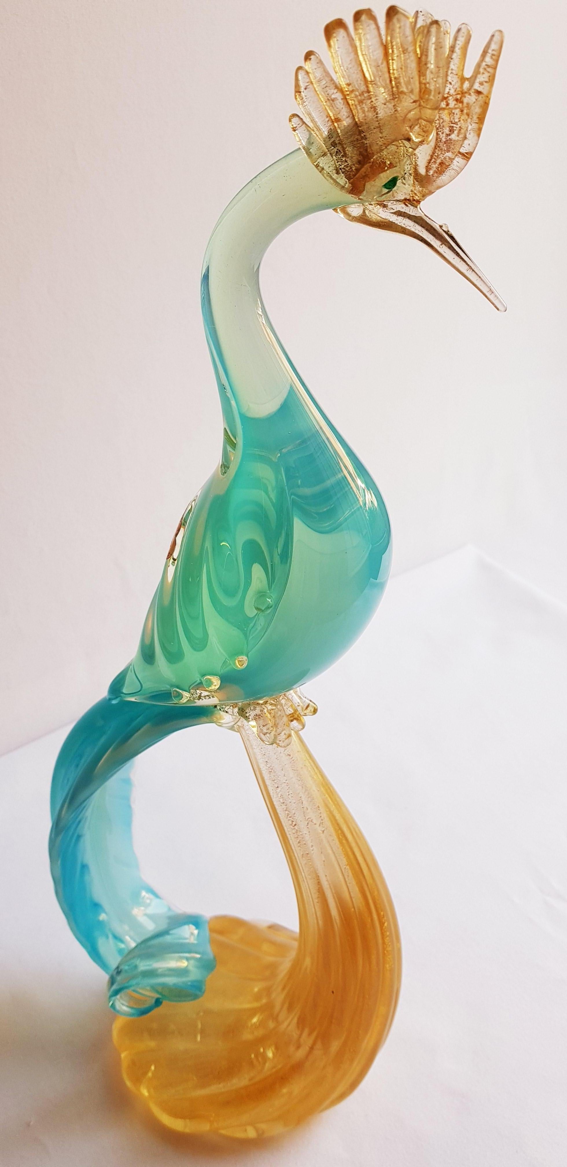 Beautiful murano glass large blue opal paradise bird with gold leaf by Alfredo Barbini brilliant condition beautiful home decor. This bird is a rare by the maestro Alfredo Barbini.