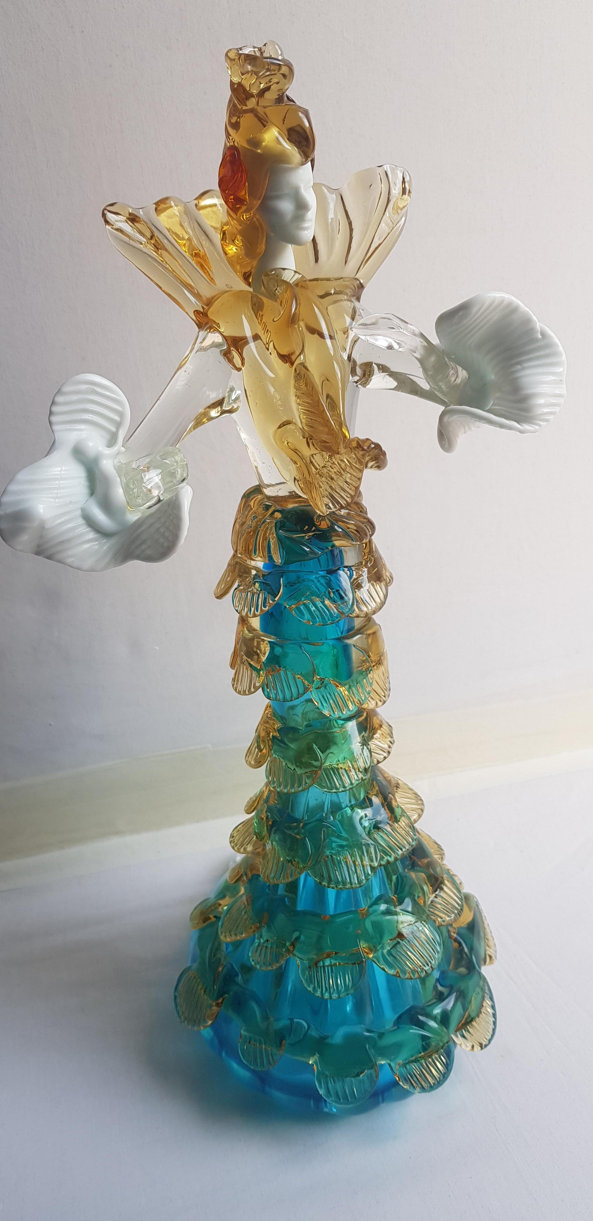 Beautiful Murano glass flamenco lady sculpture in blue, amber, white and clear signed by the artist Franco Giancarlo Toffolo; years 1960-1970. In excellent condition.