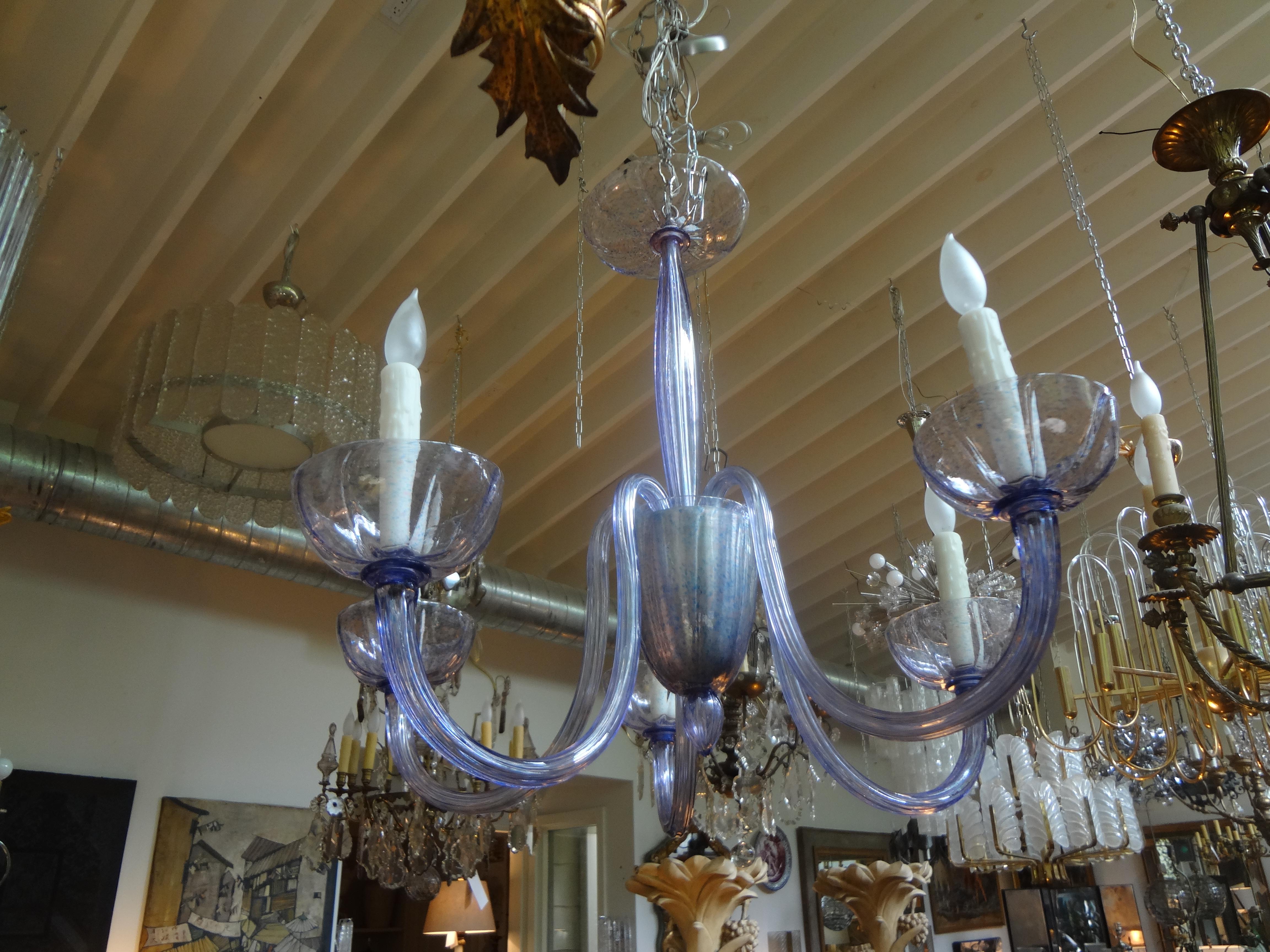 A stunning and unusual vintage violet, lavender or lilac colored Murano chandelier featuring five branches. Each piece of this glass is hand blown and the fixture has been newly wired to fit US standards. Dimensions of this fabulous Murano glass