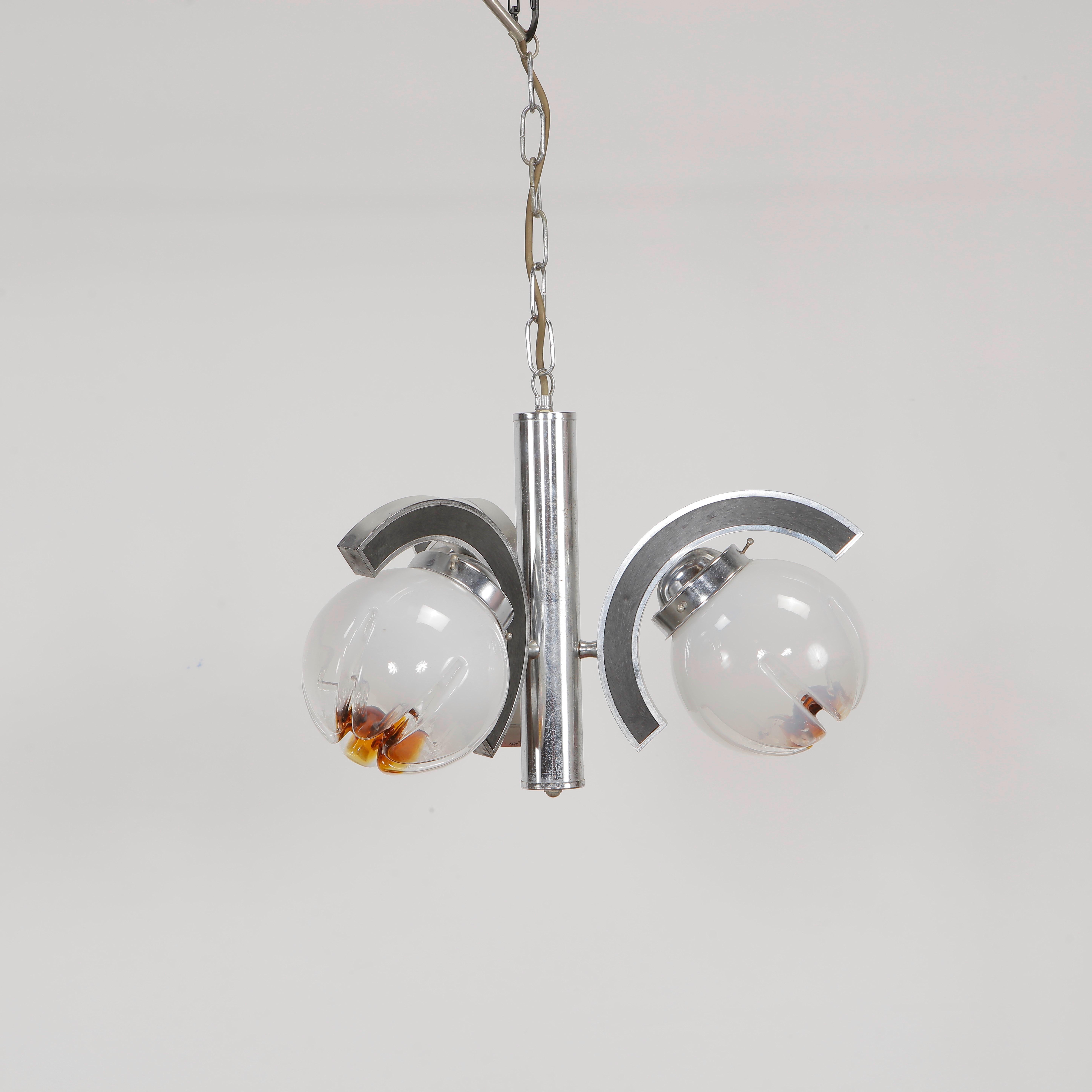 Striking Murano glass pendant light by Mazzega with three organic glass branches. Iconic 1970s Italian design. Total Height With Chain: 29 in. Height of Fixture: 12 in. Diameter: 20 in.