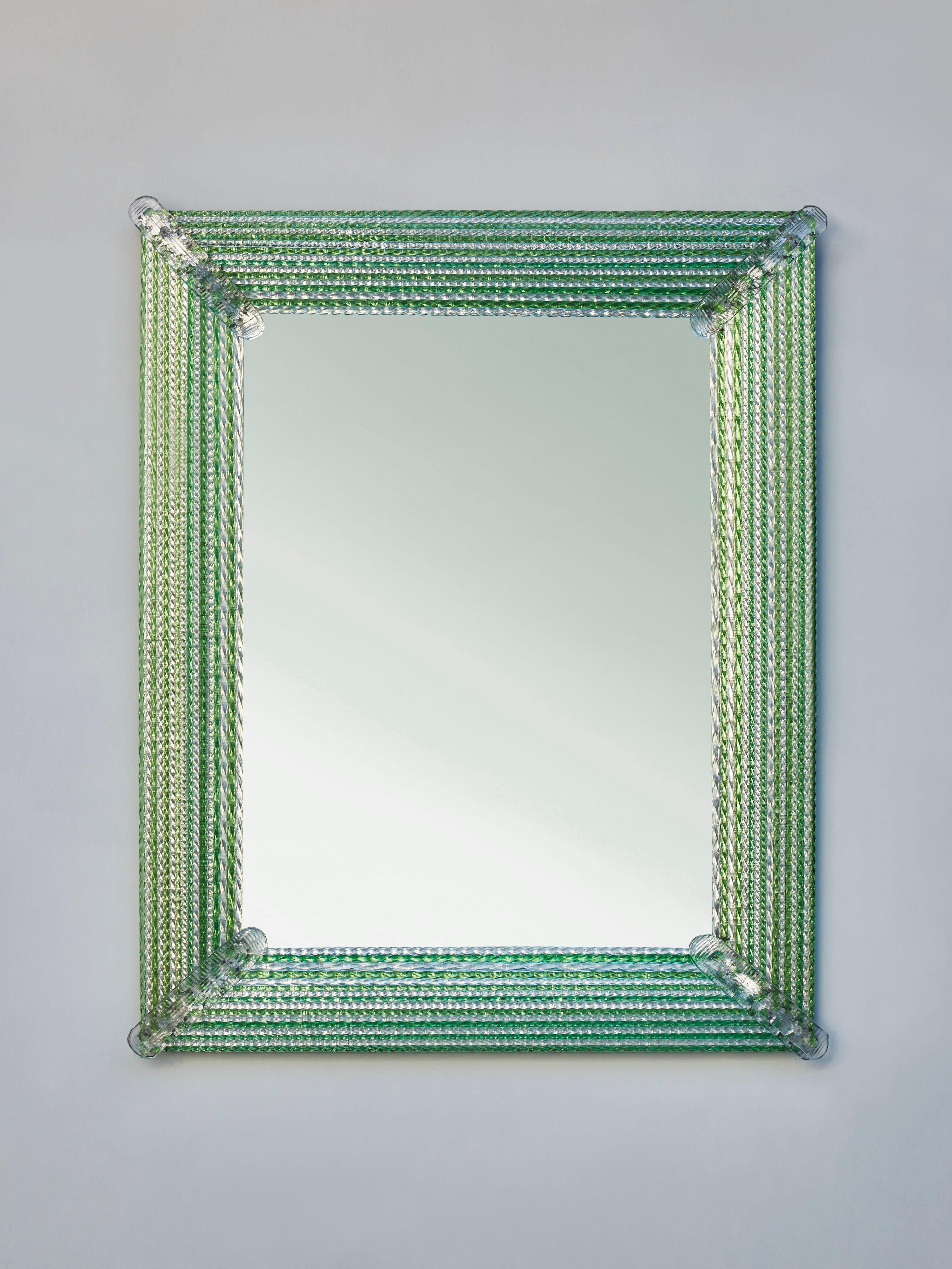 Exceptional mirror with a frame in sculpted and braided Murano glass.
Creation by Studio Glustin.
Italy, 2021.

(Pair available)
