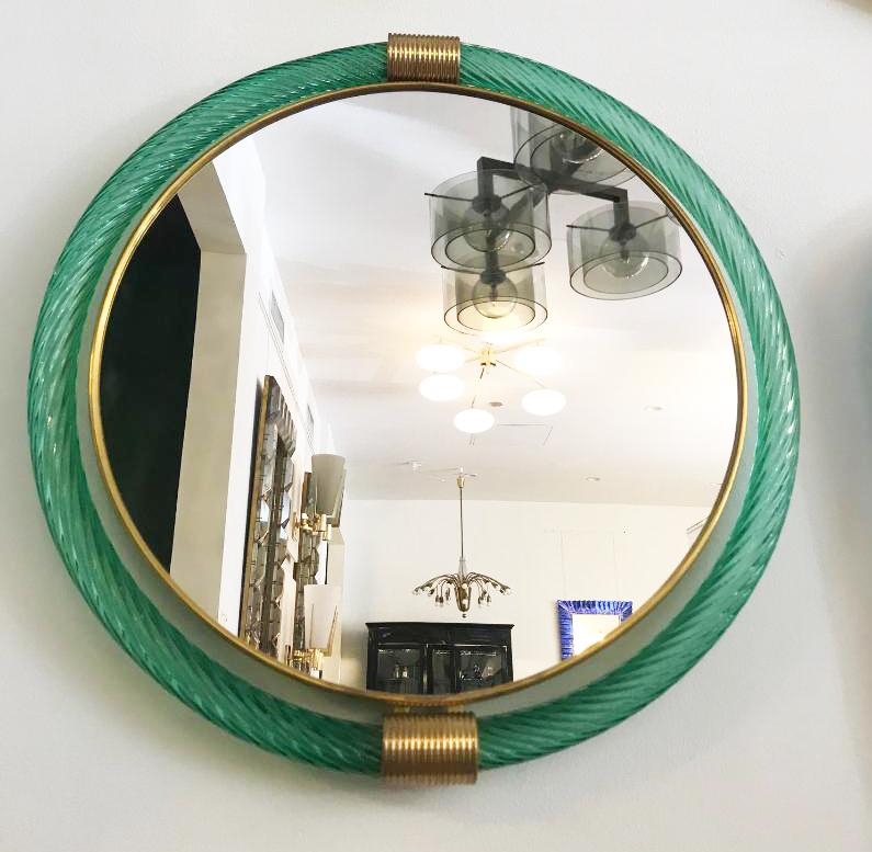Murano wall hanging mirror by Barovier & Toso. Green glass with brass details, stamped on the back.
Located in our store in Miami ready for shipping.