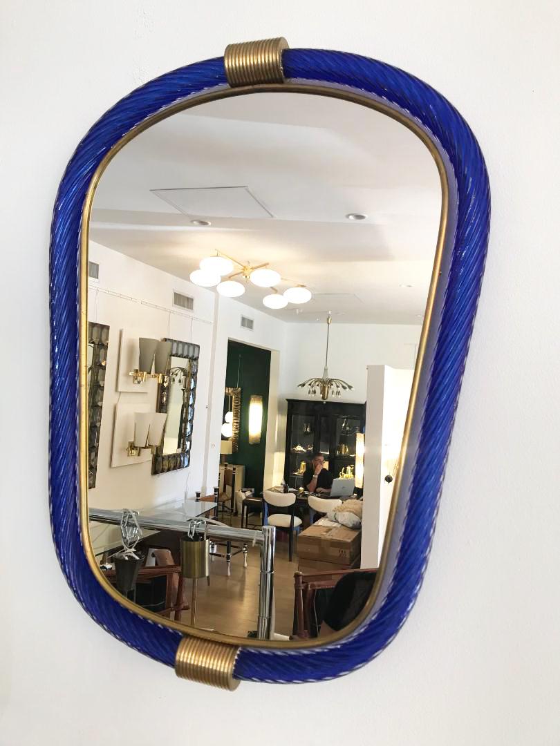 Murano wall hanging mirror by Barovier & Toso. Blue glass with brass details, stamped on the back.
Located in our store in Miami ready for shipping.