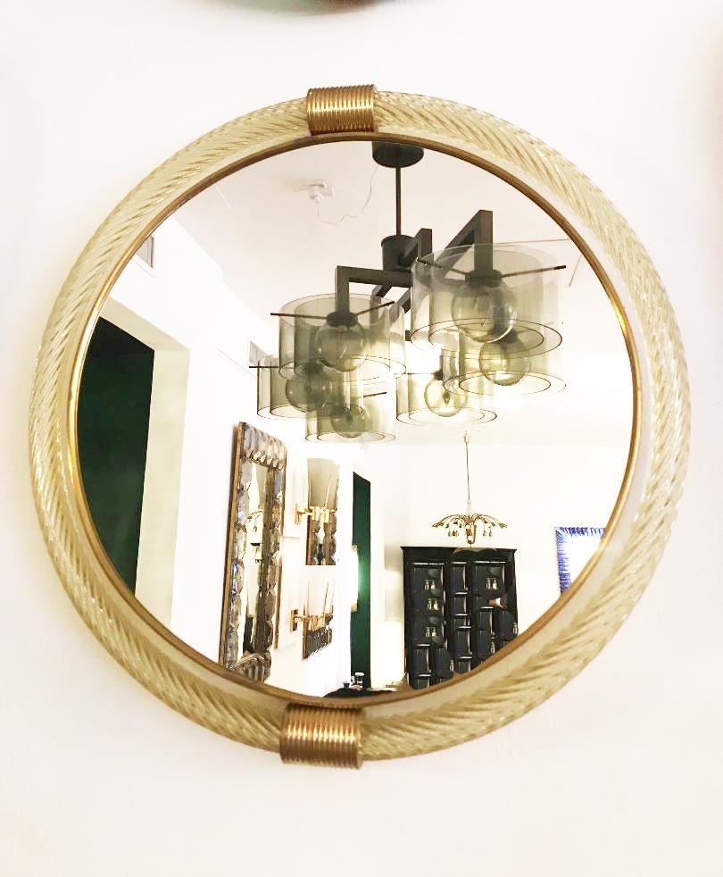 Murano wall hanging mirror by Barovier & Toso. Amber glass with brass details, stamped on the back.
Located in our store in Miami ready for shipping.