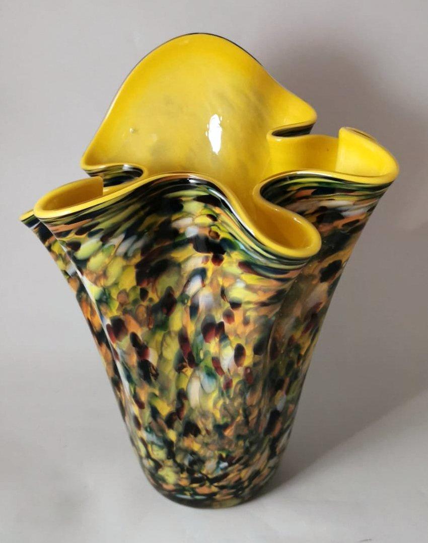 We kindly suggest that you read the whole description, as with it we try to give you detailed technical and historical information to guarantee the authenticity of our objects.
Iconic and original yellow opaline Murano glass vase; the vase was blown