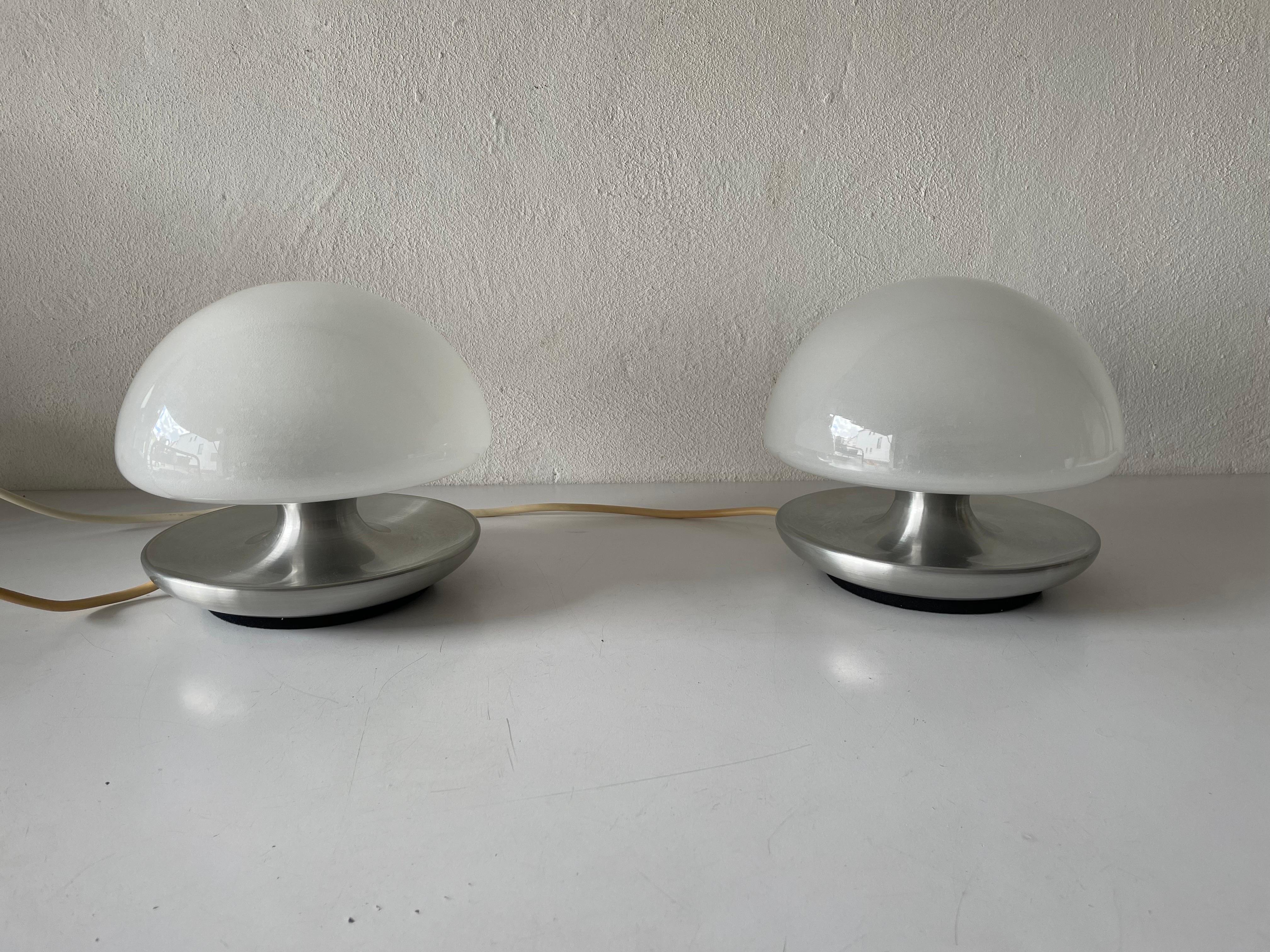 Mushroom glass Pair of Luxury Italian Table Lamps by Vittorio Balli & Romeo Ballardini for Sirrah, 1970s, Italy

Lampshade is in very good vintage condition.

When you turn the glass of the lamp to the left and right by 1 cm (almost hand touch) the