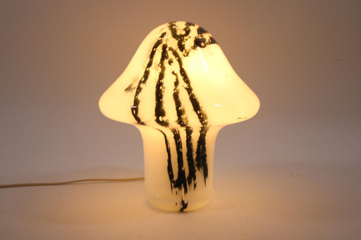 Table Lamp Murano Mushroom

This is a beautiful table lamp made of Peell & Putzler white glass with black pigment.

This is a lamp blown from 1 piece of glass.

Real craftsmanship.

materials: murano Glass


Additional information:
Dimensions: 30 Wx