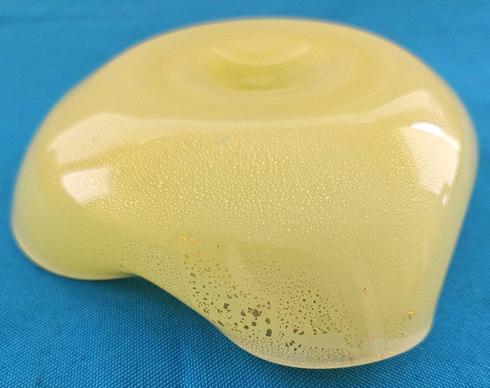 Murano Glass Opaline Yellow Bowl with Gold Polveri/Fleck. The finer polveri gives the item a sort of pearlescent look, especially on the exterior.  It is hard to show that in the photos, but it's very pretty. 
IMPORTANT INFORMATION FOLLOWS; PLEASE