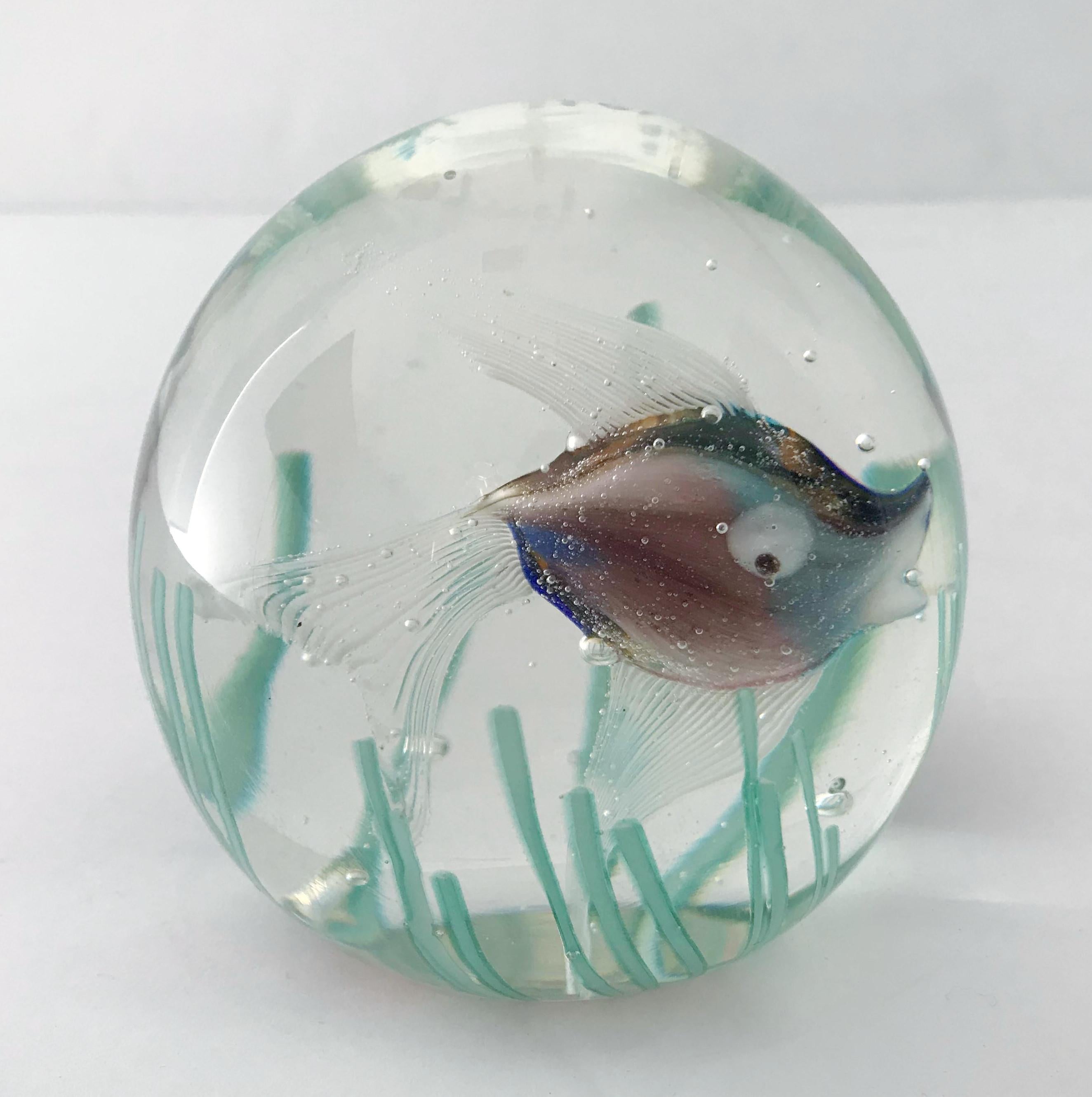 Vintage Italian hand blown Murano glass paperweight exhibiting an aquatic scene with a fish and sea grass / Made in Italy, circa 1960s
Measures: diameter 3 inches / height 3 inches
1 in stock in Los Angeles
Order reference #: FABIOLTD G134
This