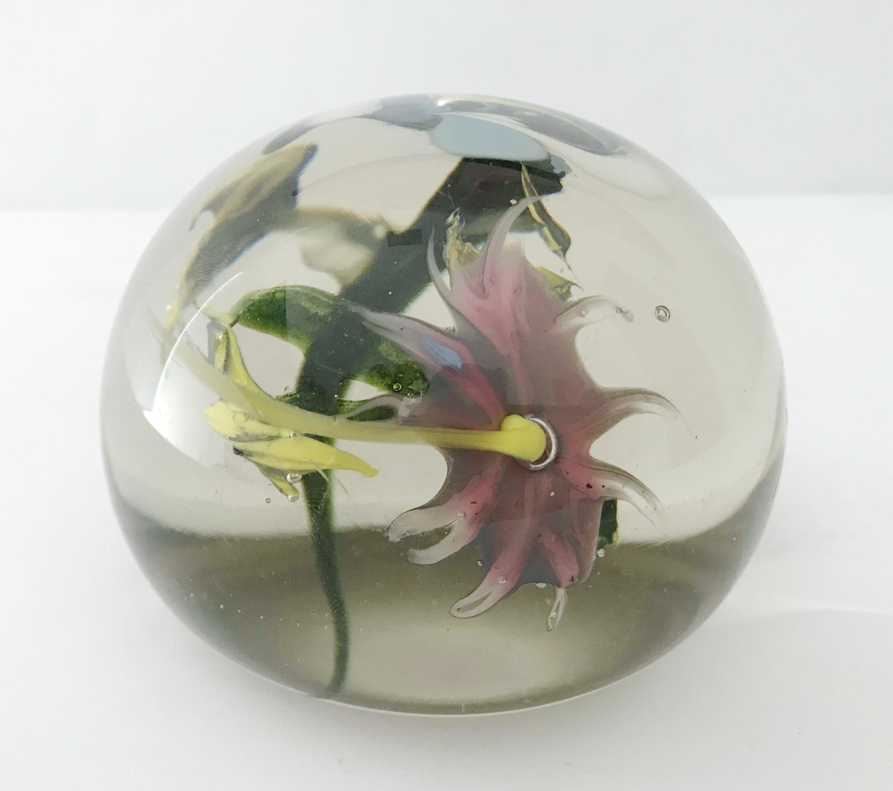 Vintage Italian Murano glass paperweight hand blown with multicolored flowers and leaves, made in Italy, circa 1960s
Measures: Diameter 3.5 inches, height 2.5 inches
1 in stock in Los Angeles
Order reference #: FABIOLTD G133
This piece makes for a