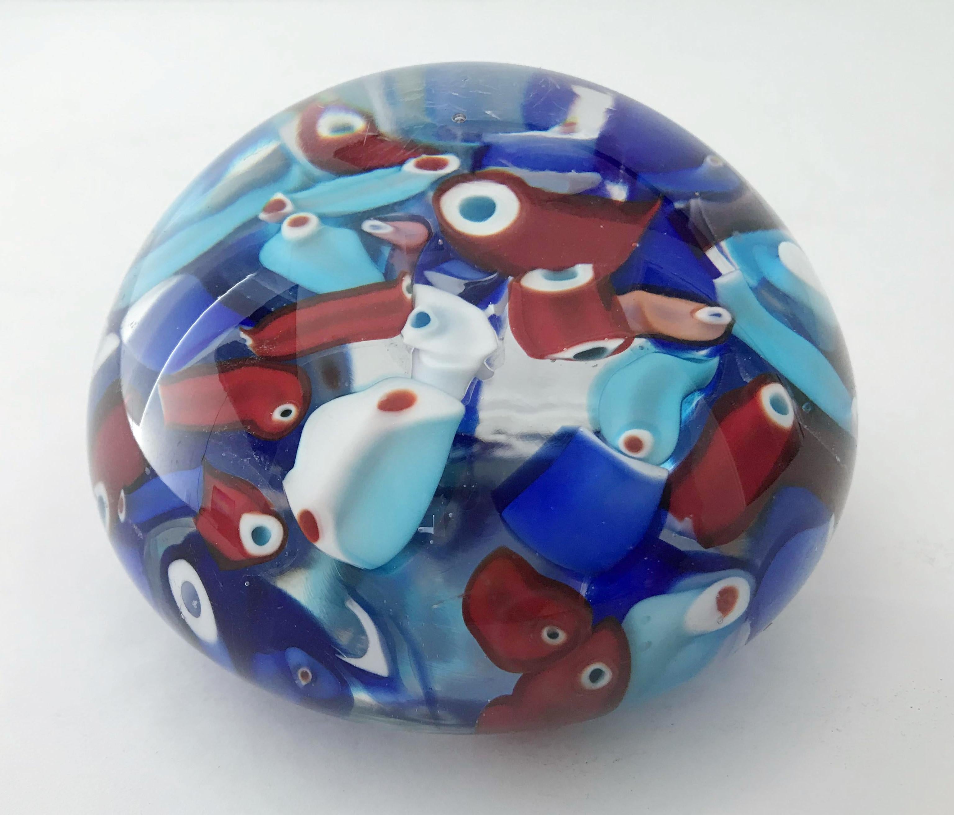 Vintage Italian Murano glass paperweight hand blown with red, white, and blue scrambled canes within the glass, made in Italy, circa 1960s
Measures: Diameter 3.5 inches, height 2.5 inches
1 in stock in Los Angeles
Order reference #: FABIOLTD