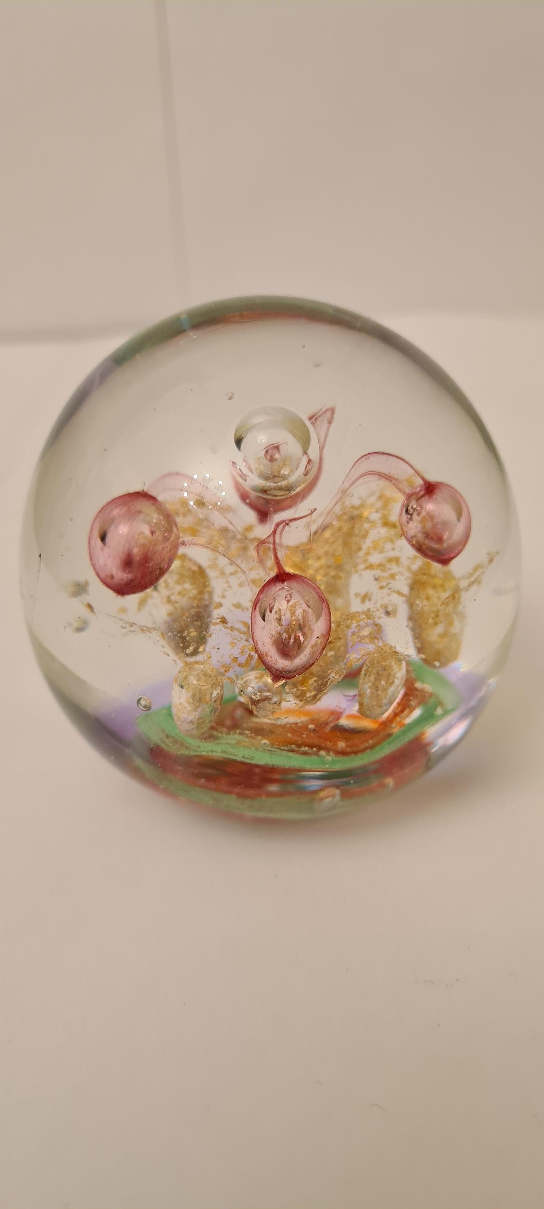 Beautifull murano glass paperweight green pink mica gold and controled bubbles gold mica bubbles and pink bubbles signed murano on the base attributed to Galliano Ferro perfect condition.