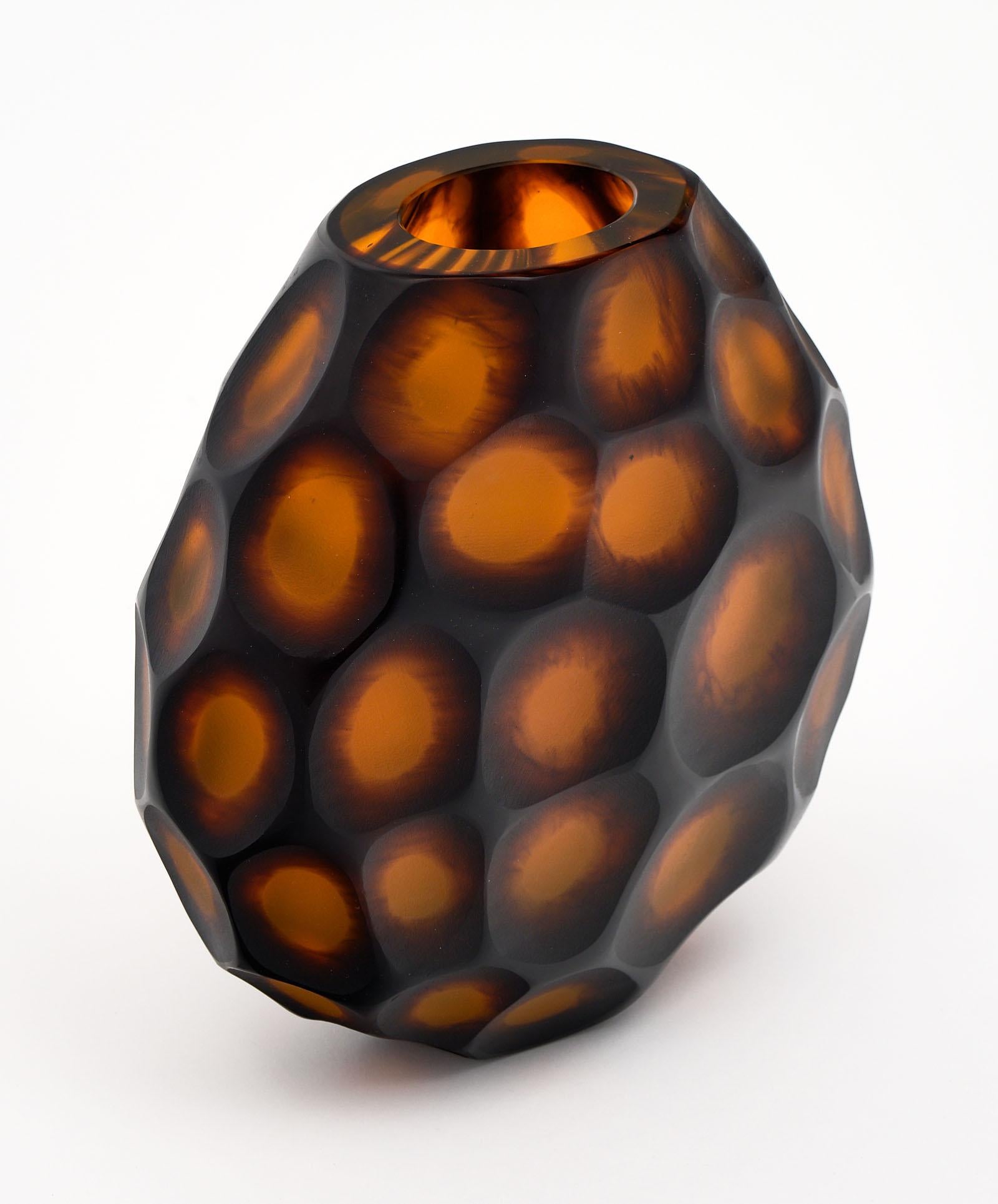 Murano glass “pavone” vase handcrafted and blown. We love this stunning piece with amber hues by Alberto Dona. Crafted by “molato a diaminte” or diamond molded. This vase is signed on the bottom.