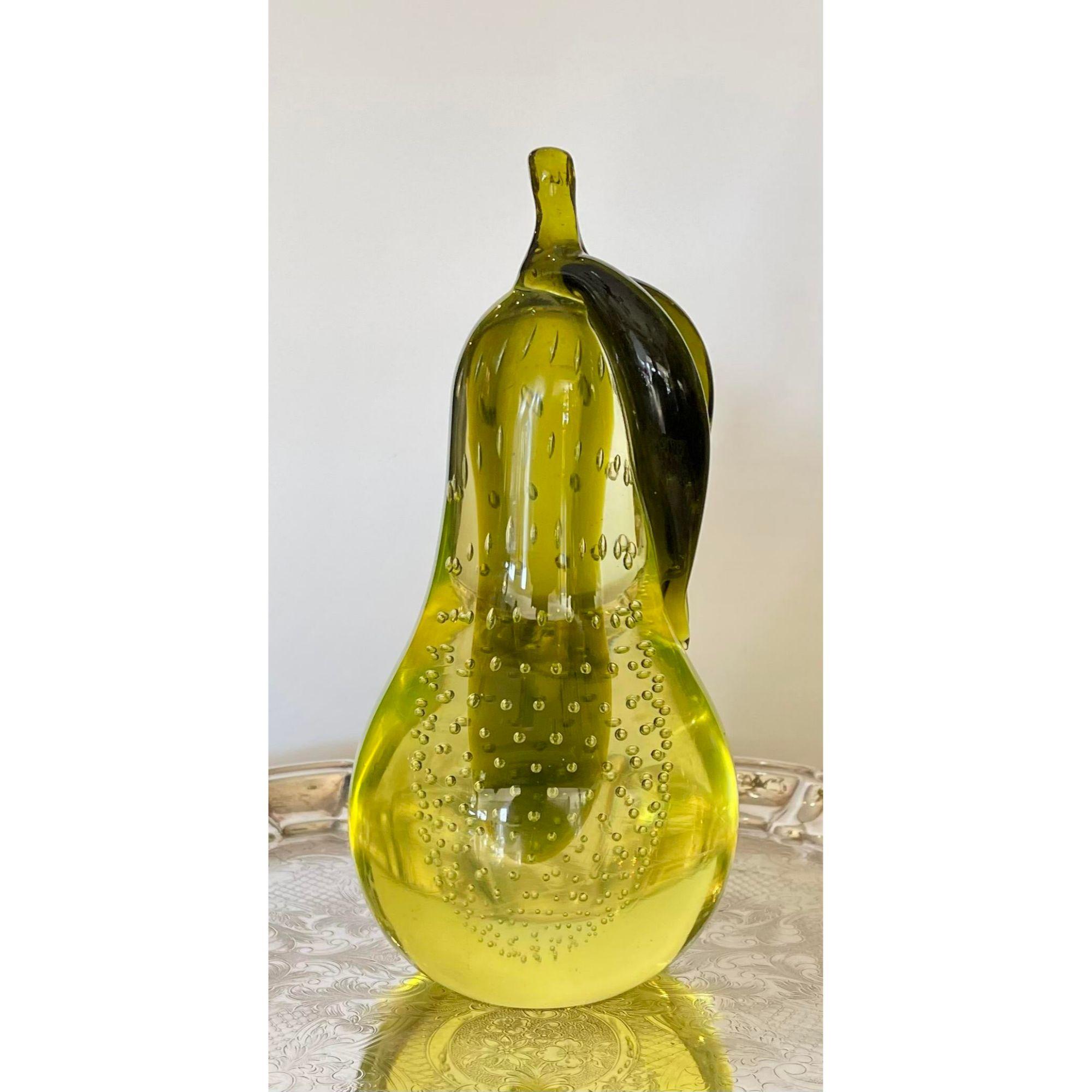 Mid-Century Modern Murano glass Magnum pear paperweight. It glows brightly under black light testing and dates to the 1950’s

Additional information: 
Materials: Murano Glass
Color: Chartreuse
Brand: Livio Seguso
Designer: Livio
