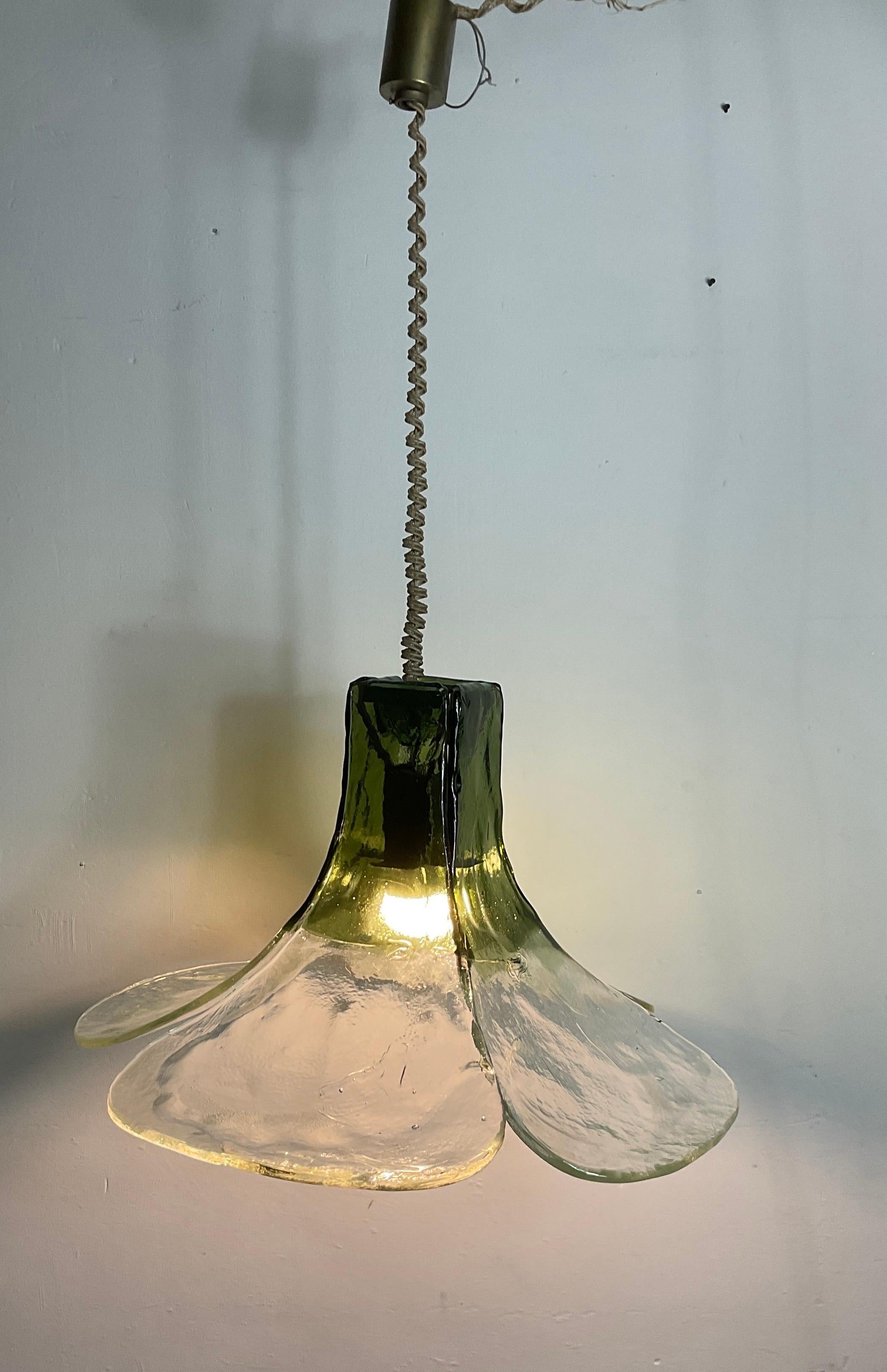 Mid-Century Shamrock Murano pendant.  Model Cascata byy Carlo Nason for Mazzega, Italy 1960s  Rare green color. For the Cascata (Italian for “waterfall”), which debuted in the 1960s, Nason achieved the effect of cascading water through an inverted