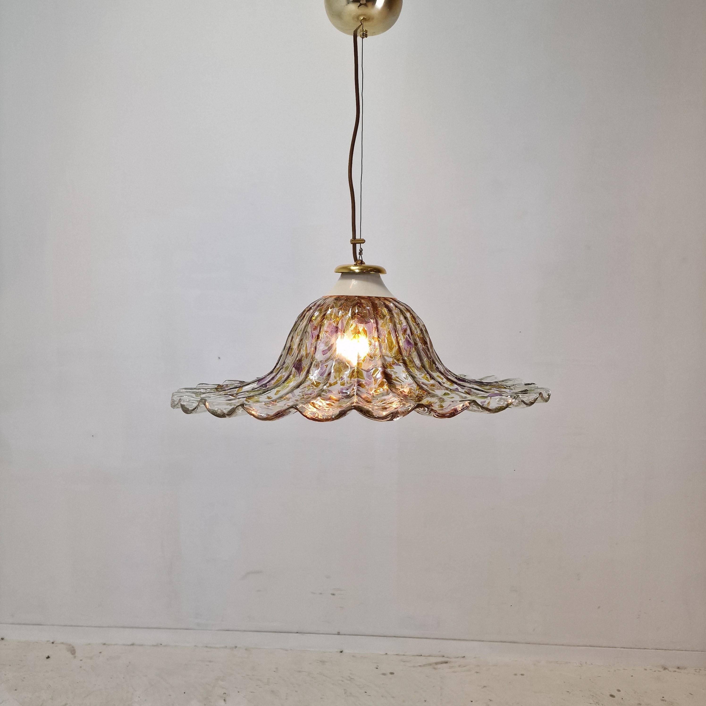 Beautiful Italian pendant fabricated by La Murrina, 1980's.

The lamp shows true Murano craftsmanship. 
Hand blown glass in different colors and transparent. 
It gives a beautiful lift in your room.

Very good vintage condition, no cracks or chips.