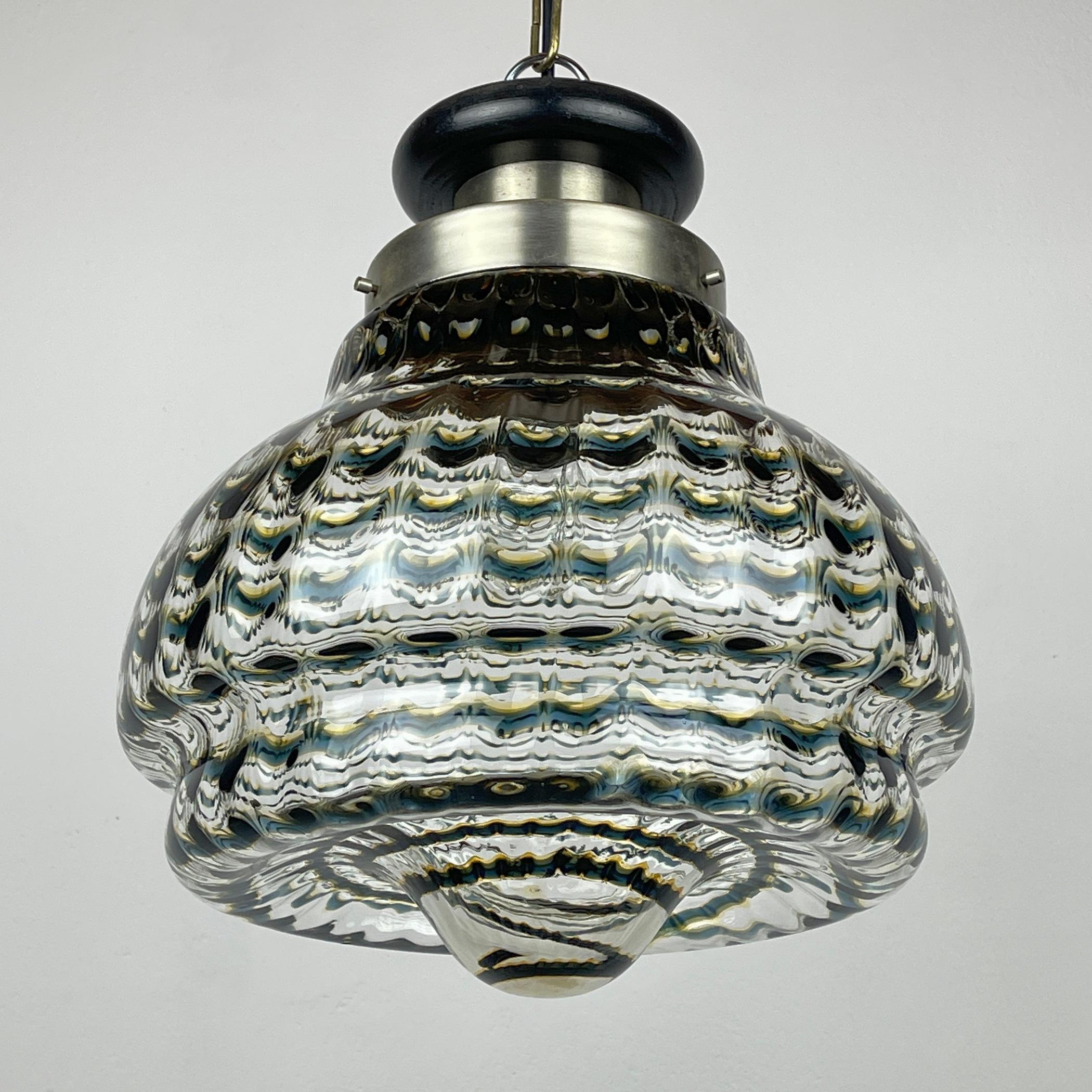 Presenting the exquisite hand-blown Murano glass pendant lamp, a rare gem hailing from Italy in the 1960s. This extraordinary chandelier is a prized find in the vintage market, showcasing the unparalleled beauty and craftsmanship of Murano