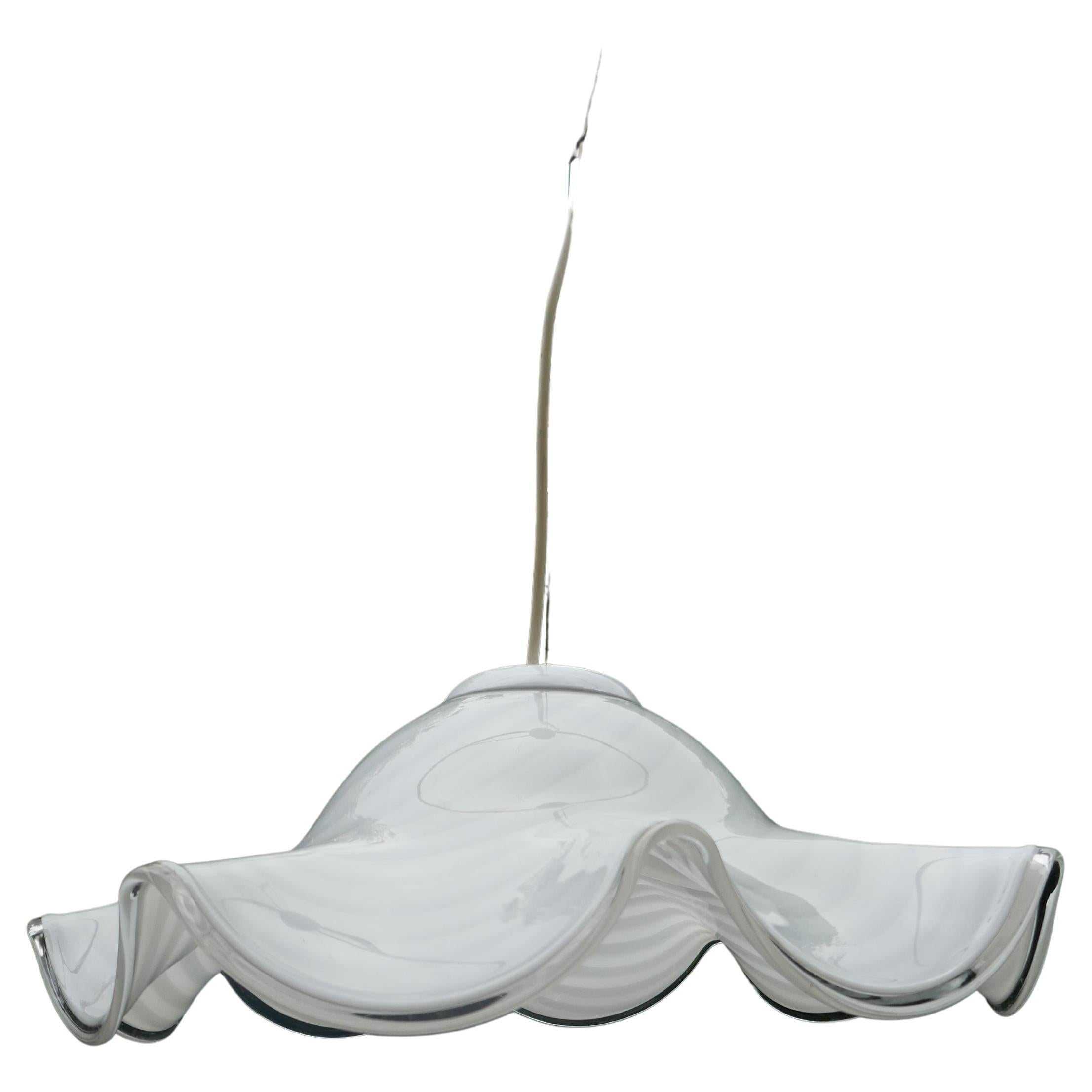Murano glass pendant lamp with spiral vortex glass.