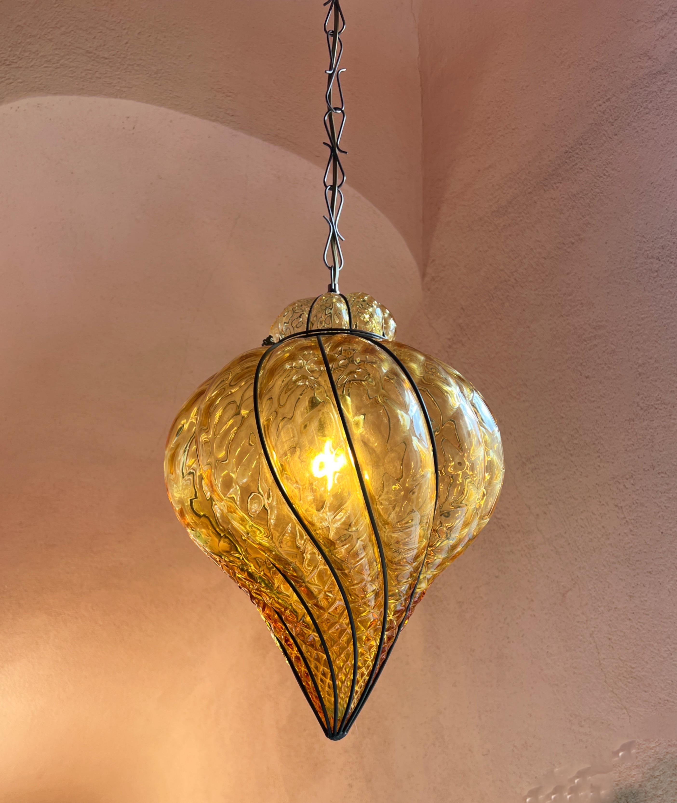 Italian Murano glass pendant light in amber coloured glass, 1980s  For Sale