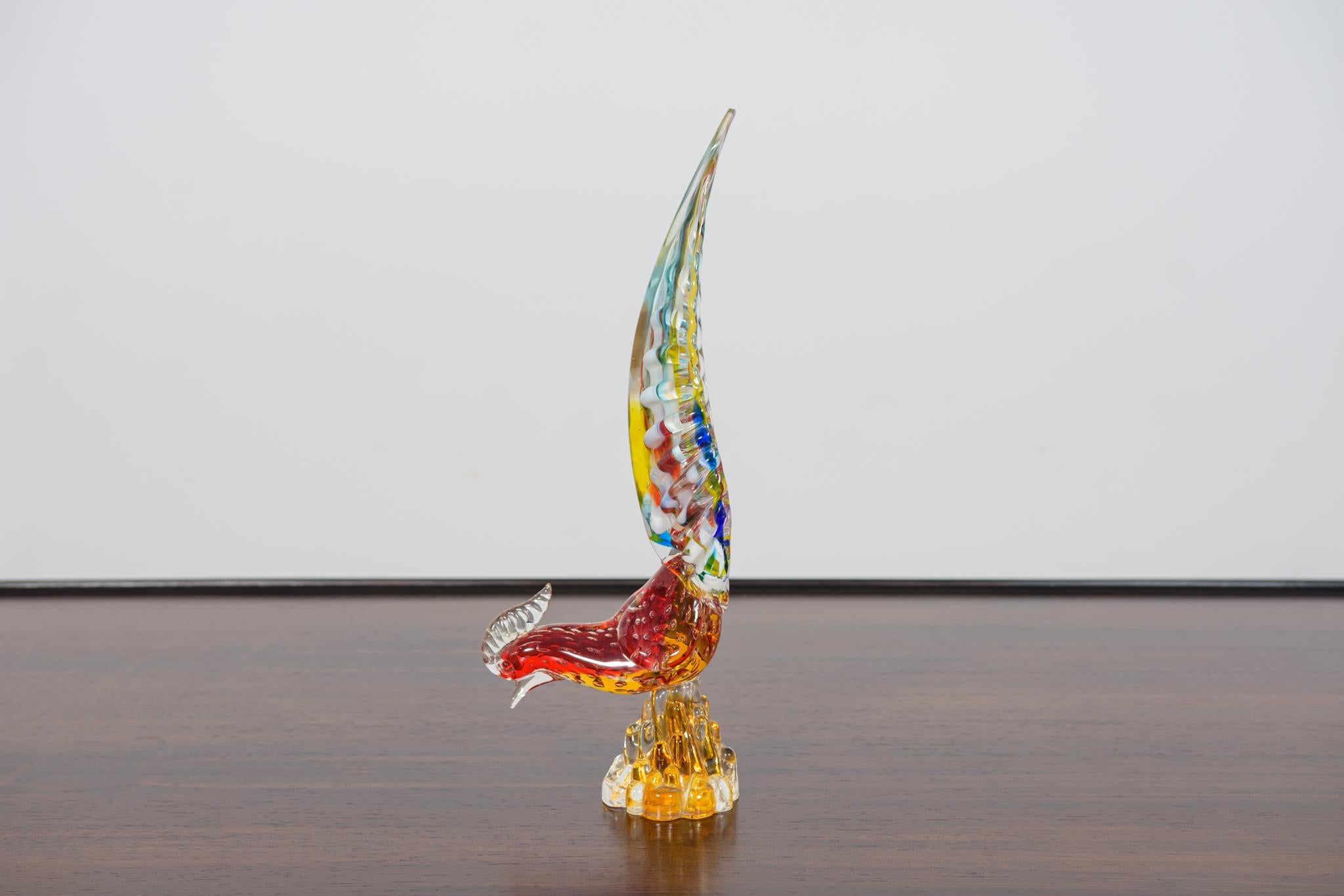 Beautiful multi-colored pheasant sculpture made of Italian Murano art glass. Documented by designer Alfredo Barbini. The glass is made using the bullicante technique, which involves the controlled addition of bubbles. Clear glass surrounds a layer