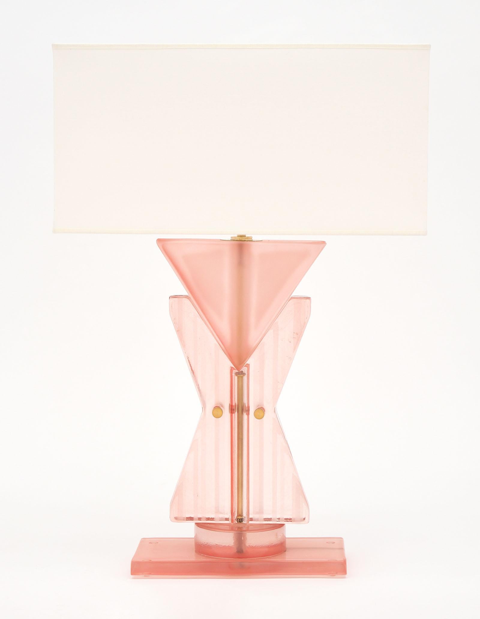 Murano glass pink geometric TOTEM lamps in a beautiful and striking pink hue. We love the hand blown glass elements and bold impact of this pair. They have been newly wired to fit US standards.

This pair is currently located at our dealer's