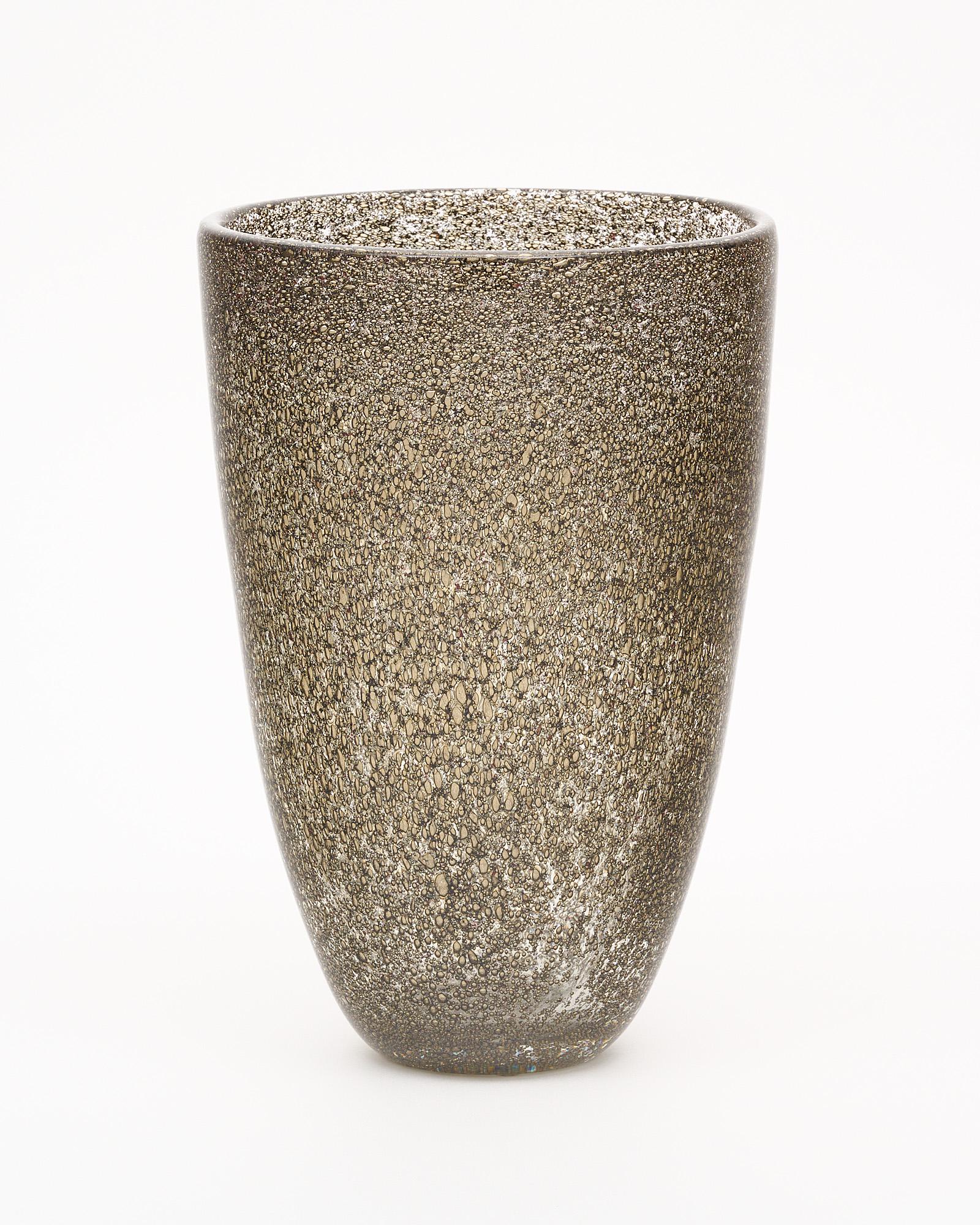 Vase from the island of Murano, Italy. This hand-blown vase is crafted using the pulegoso technique. Pulegoso glass, which appears full of bubbles, is made by injecting into the molten glass a component that reacts and in doing so releases gas