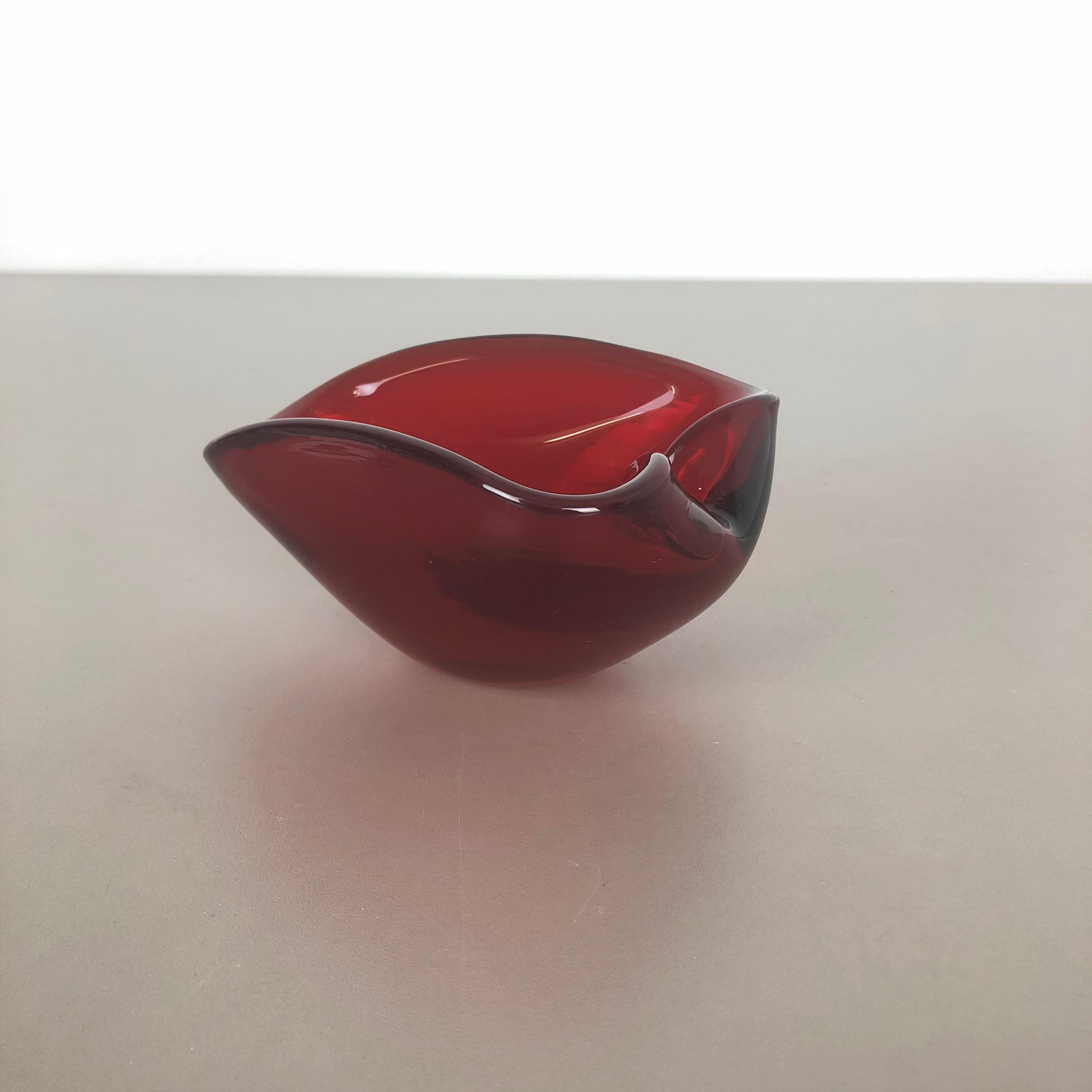 Article:

Murano glass bowl, ashtray element


Origin:

Murano, Italy


Decade:

1970s



This original vintage glass bowl element, ash tray was produced in the 1970s in Murano, Italy. It is made in high quality Murano technique and