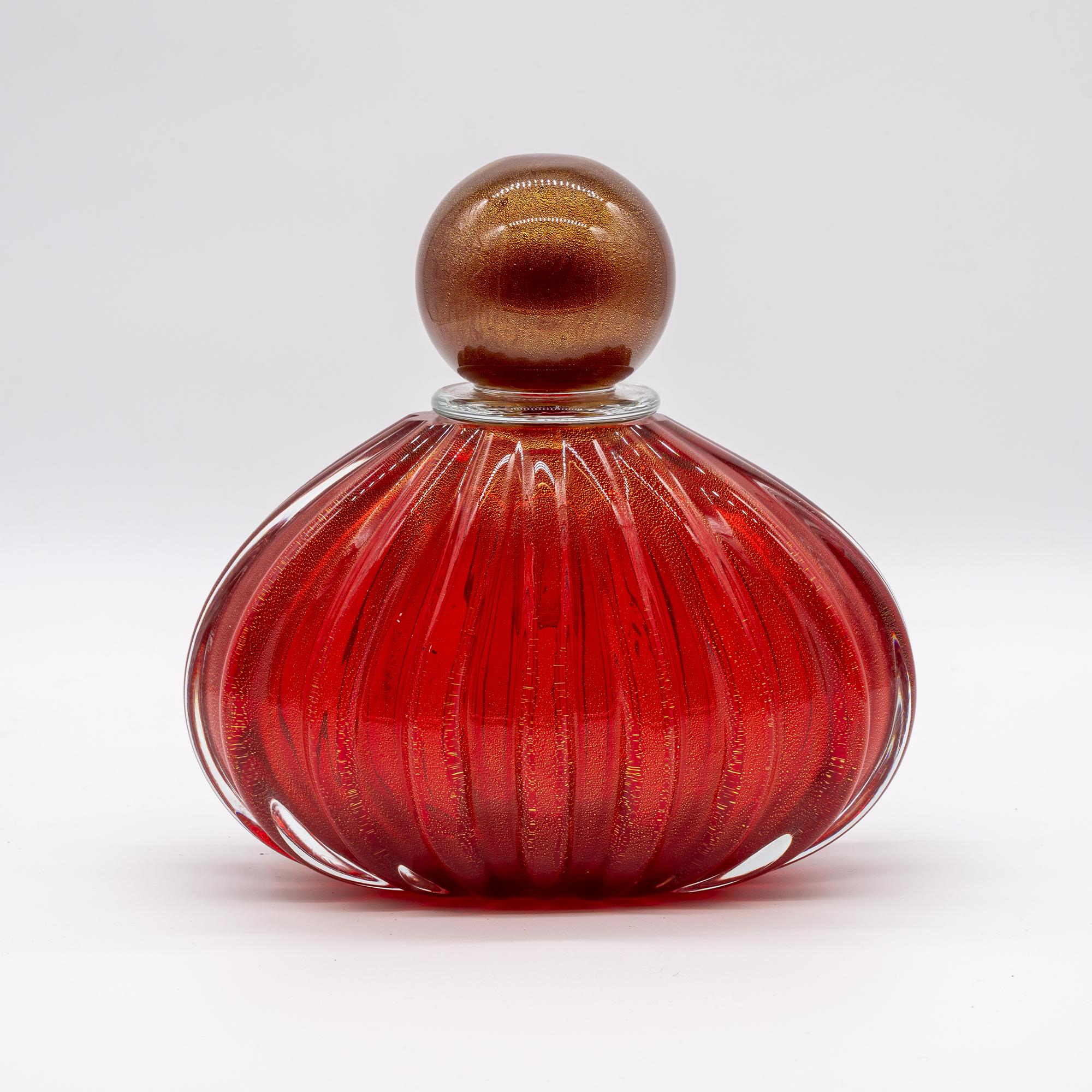 Murano glass parfum bottle vase, mouth blown, in red color. 
Made in Murano and purchased directly from the manufacturer.

Measures: 18cm diameter 20cm height

All of our glass items, vases, lights etc are truly made in Murano and we can