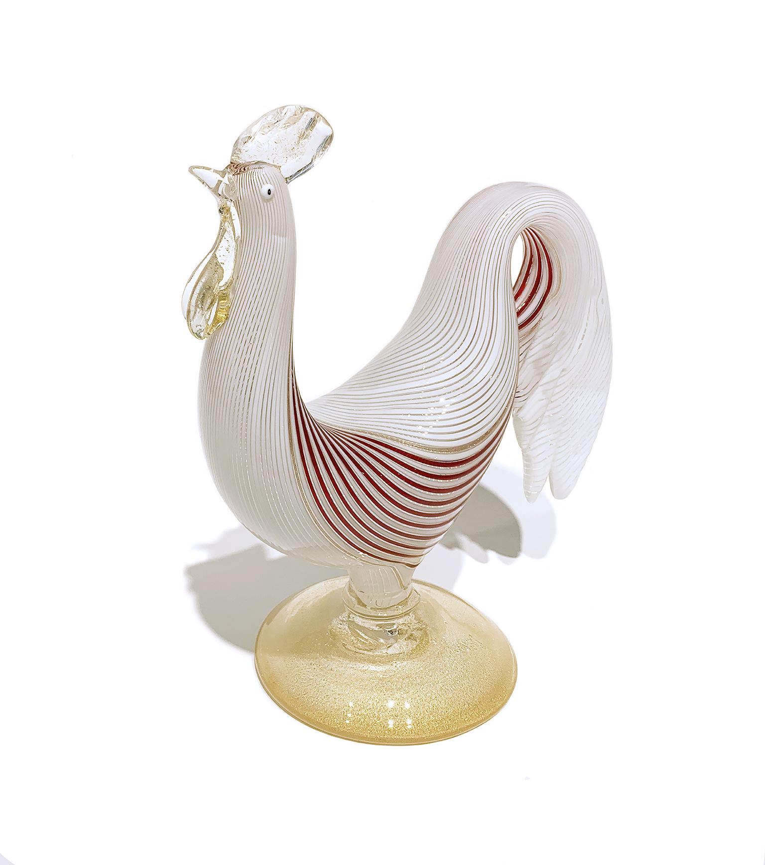 Rooster- shaped sculpture Galletto 
Dino Martens (1894 - 1970)
Vetreria Artistica Rag. Aureliano Toso, 1954 
It measures 9.25 inches in height x 8.18 in x 4.4 in (23.5 cm x 20.8 cm x 11.4 cm)
It weighs 2.57 lb (1.169 g)
State of conservation: