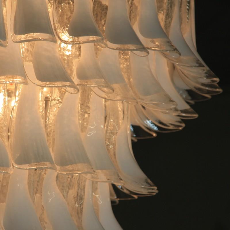 Large Murano 8-tier glass chandelier with well over 140 pieces of 'horse shoe' glass with white coloration. White steel frame construction, Italy.