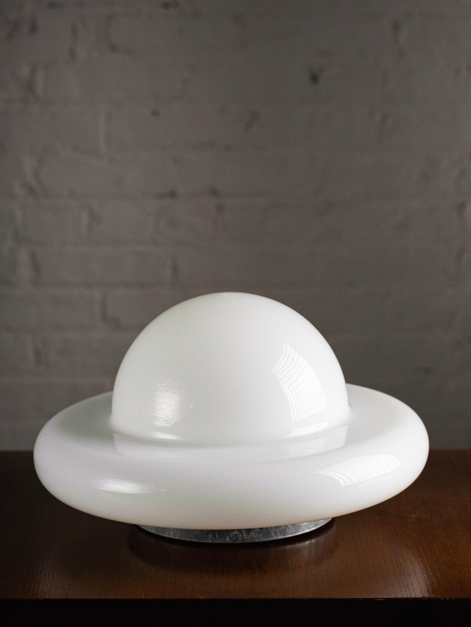 A white Murano glass lamp. Mushroom or saucer silhouette on a nickel base. May also be hung as a sconce or flush mount ceiling light. Sourced outside of Florence, Italy.