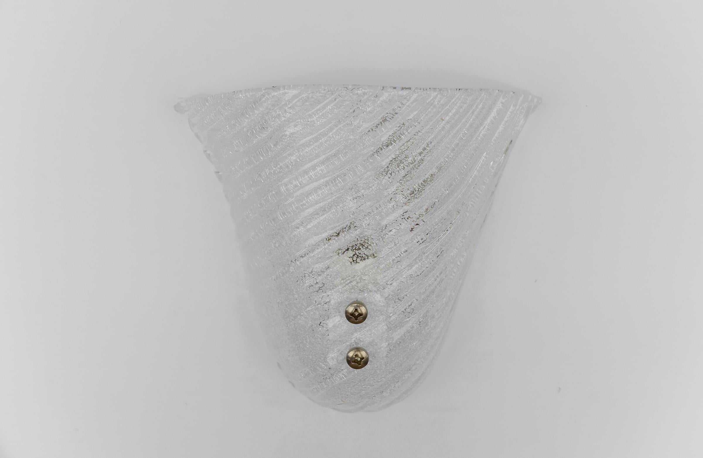  Murano Glass Sconce or Wall Lamp, 1960s

The wall lamp come with 1 x E14 / E15 Edison screw fit bulb holder, is wired and in working condition. It runs both on 110/230 Volt. Delivery without bulb.

Our lamps are checked, cleaned and are suitable