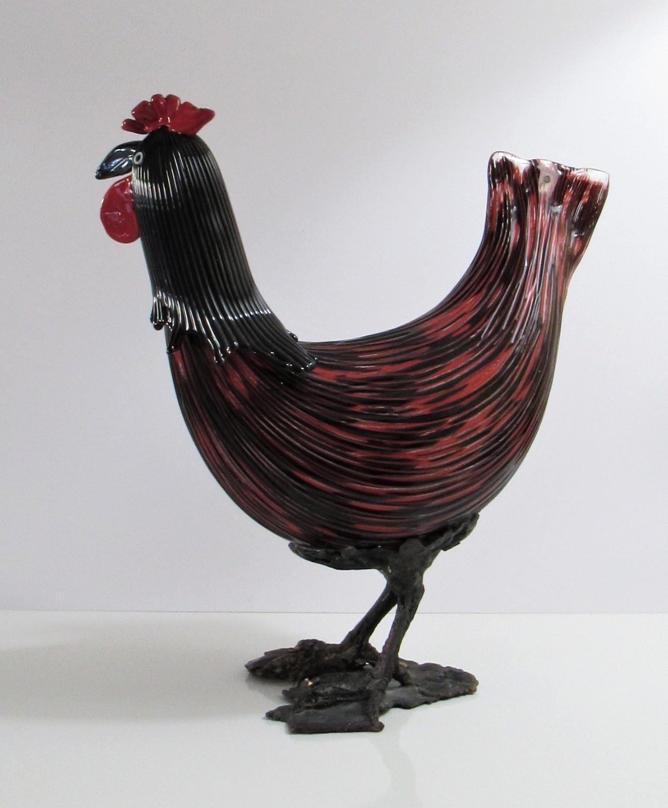 Toni Zuccheri for Venini Murano Glass Sculpture of a Rooster, Signed, 1979

Offered is a fine and rare sculpture of a rooster from a series of birds designed by Toni Zuccheri for Venini in 1964 and presented at the 32nd Venice Biennale. Made of red