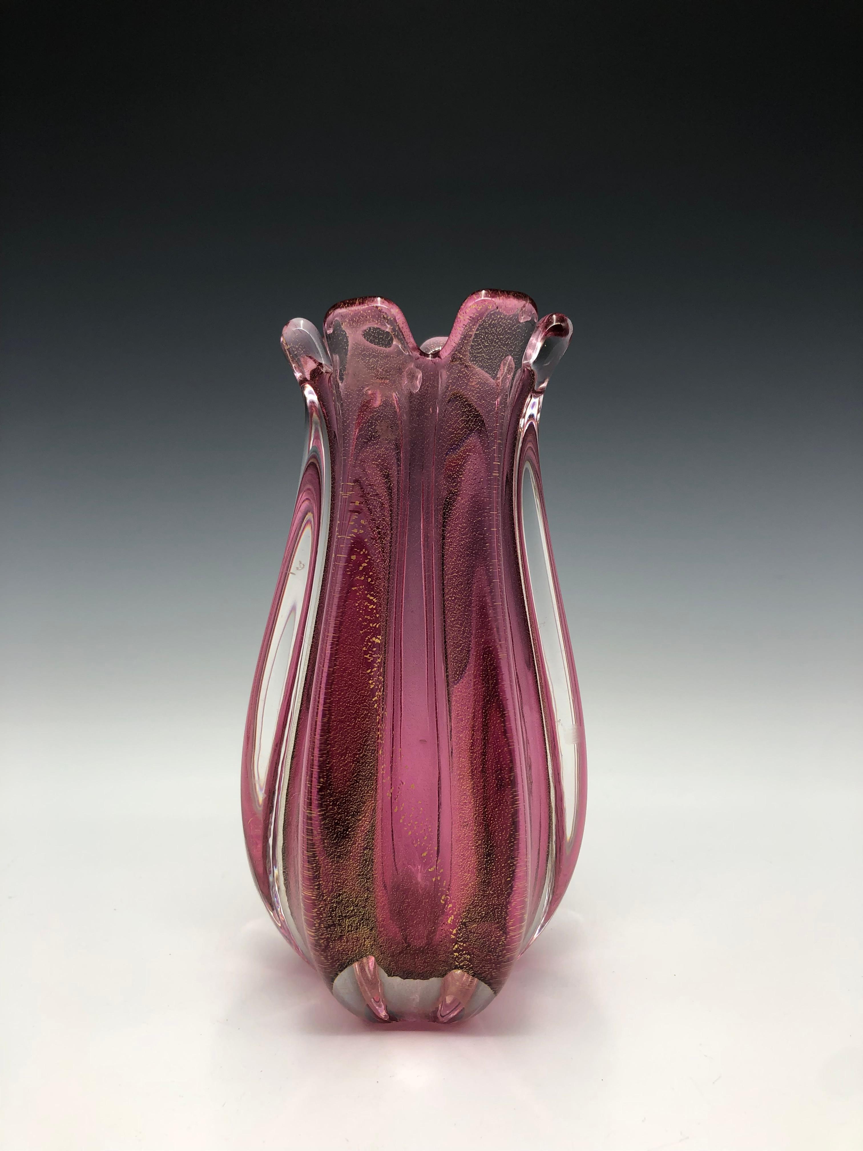 Stunning pink Murano ribbed gold-specked glass Sommerso bud vase created in a traditional workshop on Murano island using a rare gold leaf technique. 24K gold leaf is infused into cristallo glass under high temperatures inside special glass-making