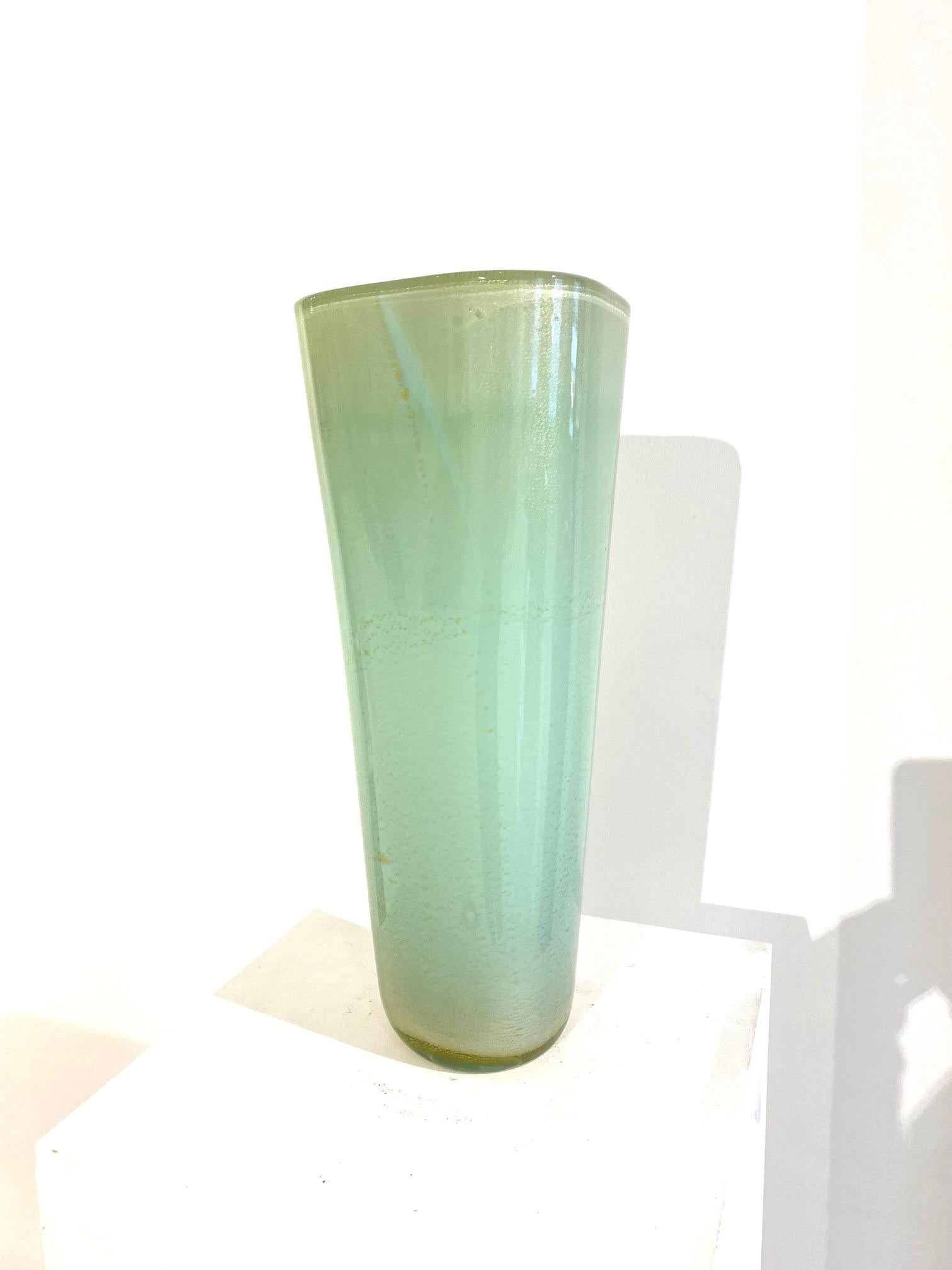 Murano glass “sea foam” and gold specks vase by Seguso Italy: circa 1950

H:17.5 W:6.75 D:6.75 in.

					
