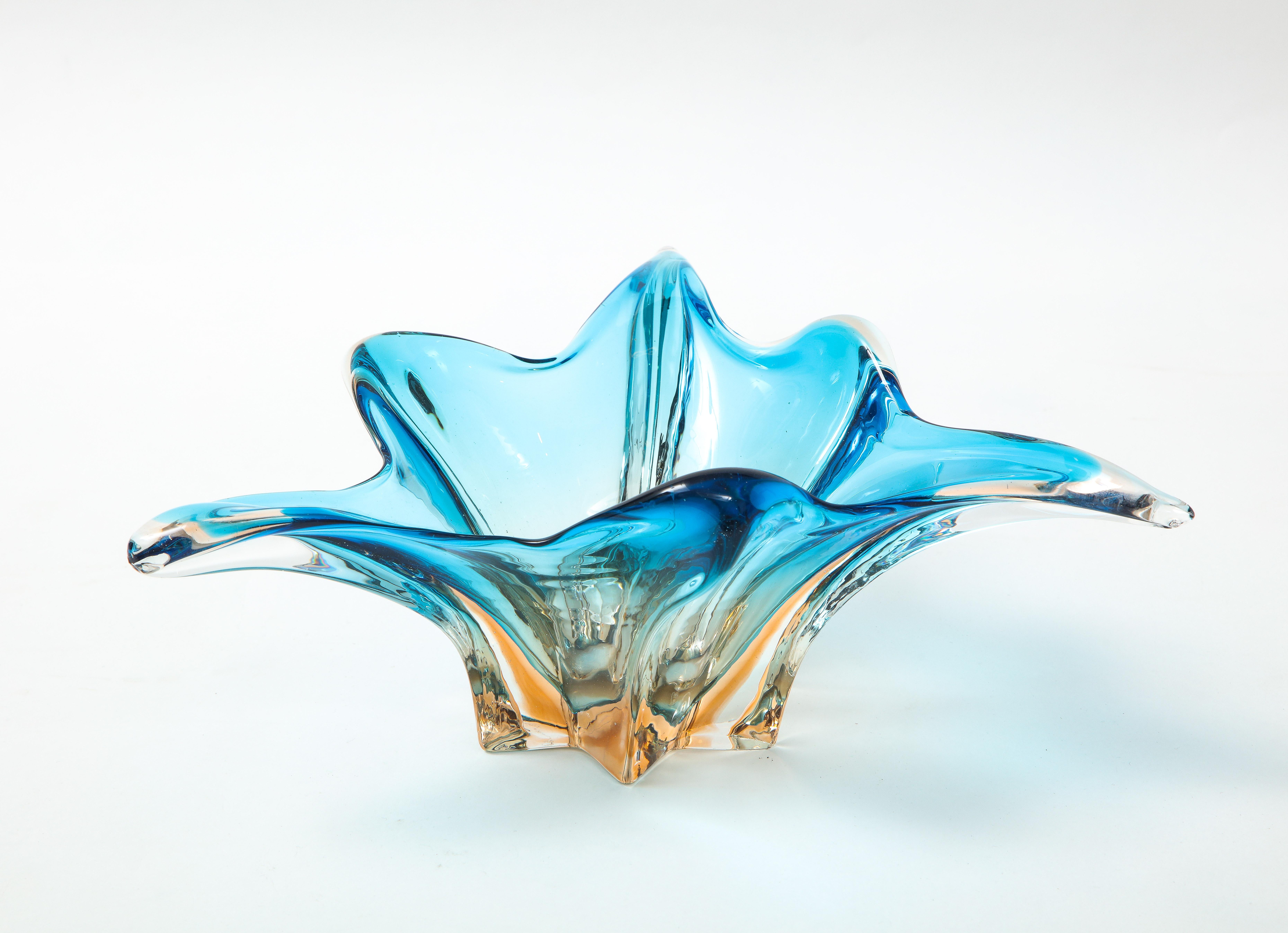 Eye catching Murano glass vessel in vibrant sky blue and orange tones.