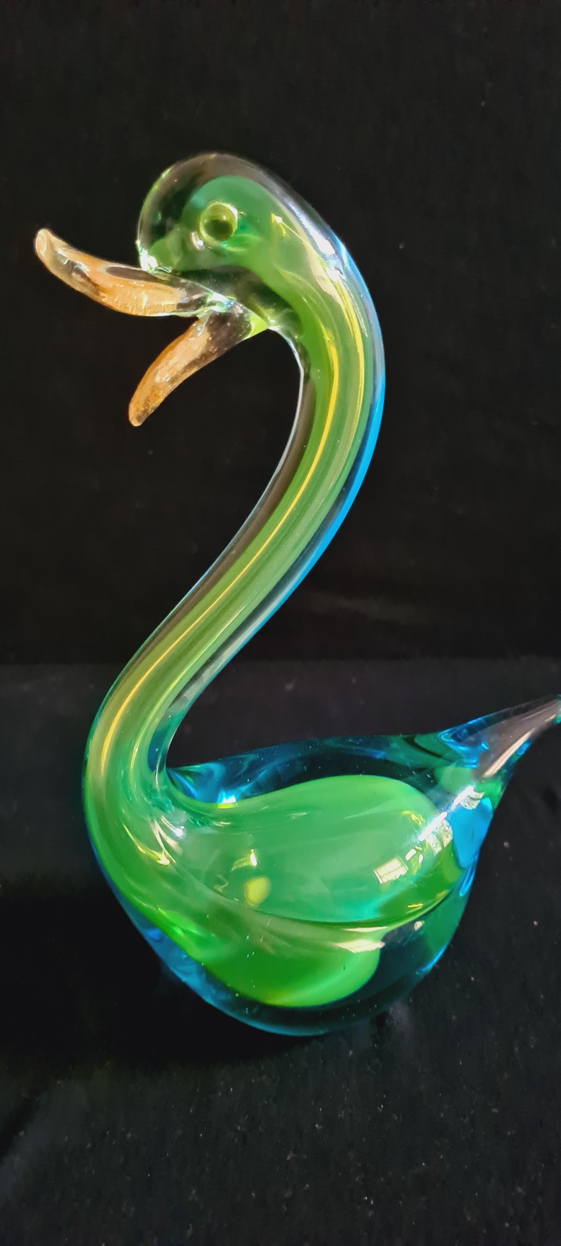 Beautiful vitange Murano glass sommerso duck in blue and lemon green with gold leaf,  attributed to Archimede Seguso. In excellent condition.