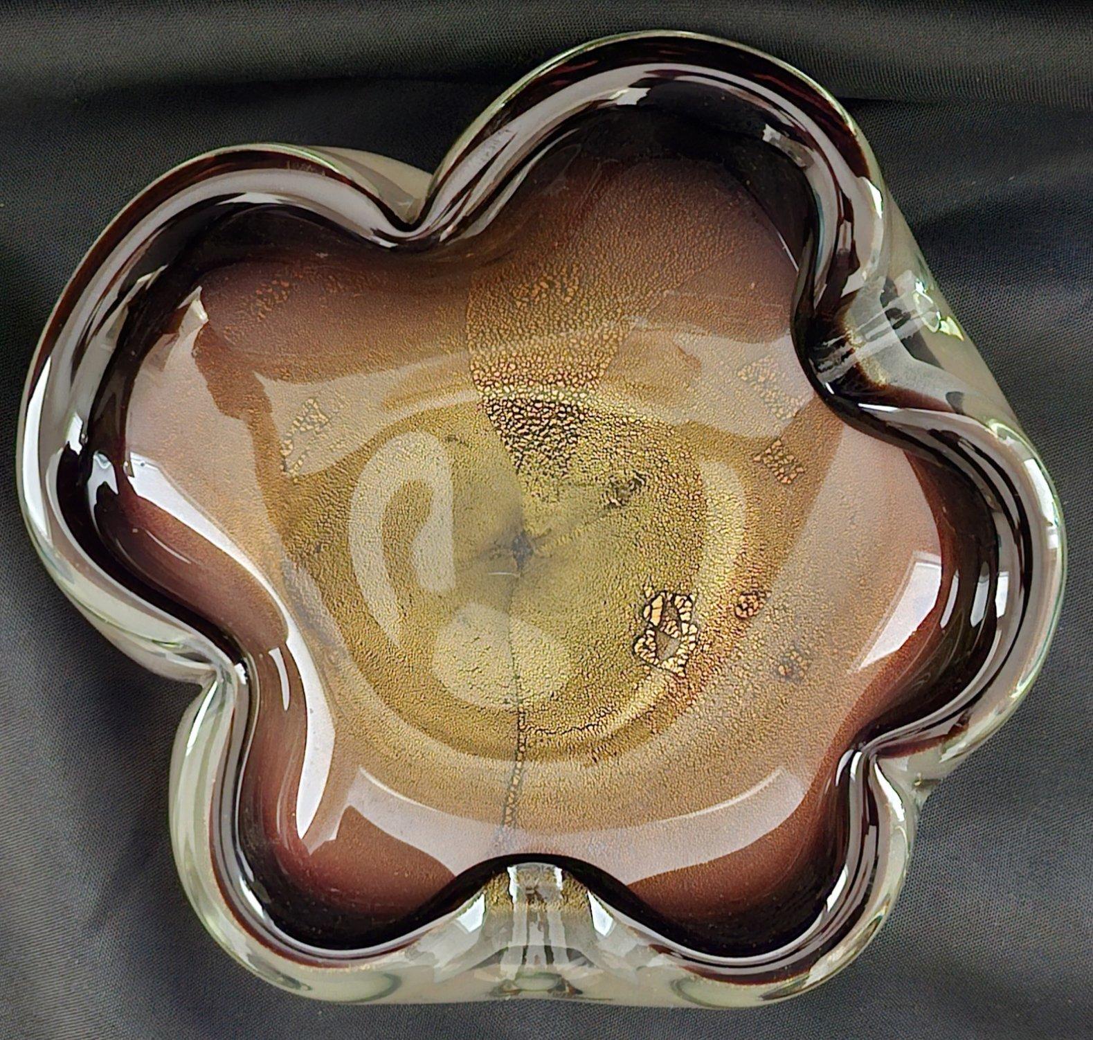 Murano Glass Sommerso Dish/Ashtray/Bowl w/Gold Polveri, Seguso/Barbini suspected
Measures about 7.5 x 7 x 1.75 inches.
This is a gorgeous piece which we feel may well be a Seguso or Barbini piece.
The colors are stunning as is the shape. 
On a light