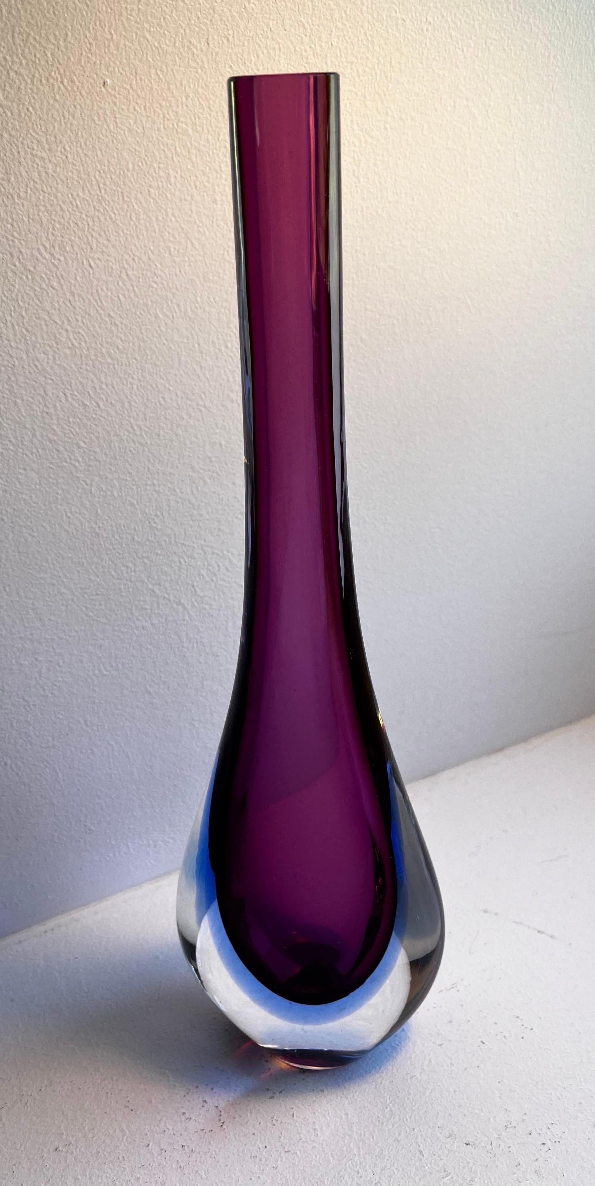 Murano Glass Sommerso Stem Vase

amethyst in blue sommerso
graceful teardrop shape
attributed Flavio Poli for Seguso Vetri d'Arte, Italy
unsigned
circa 1960s.