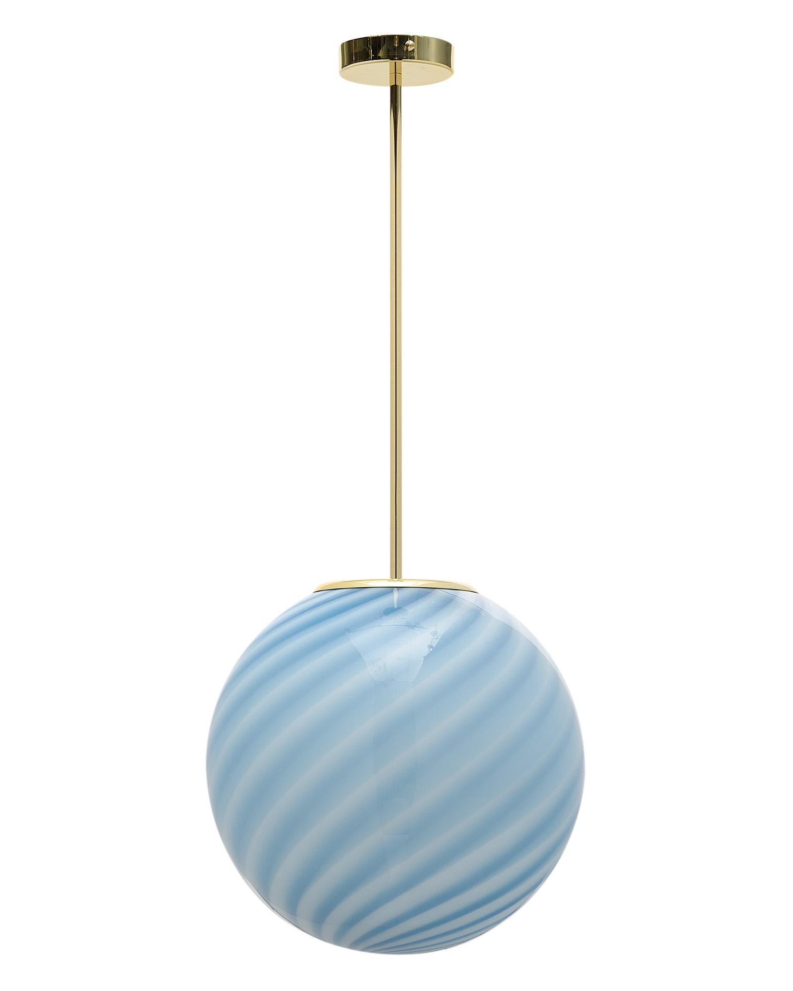 Spheric glass pendant light, Italian, from the island of Murano. This hand-blown glass globe features a blue and white swirling pattern. A galvanized gilt brass stem and canopy support this fixture. It has been newly wired to fit US standards.