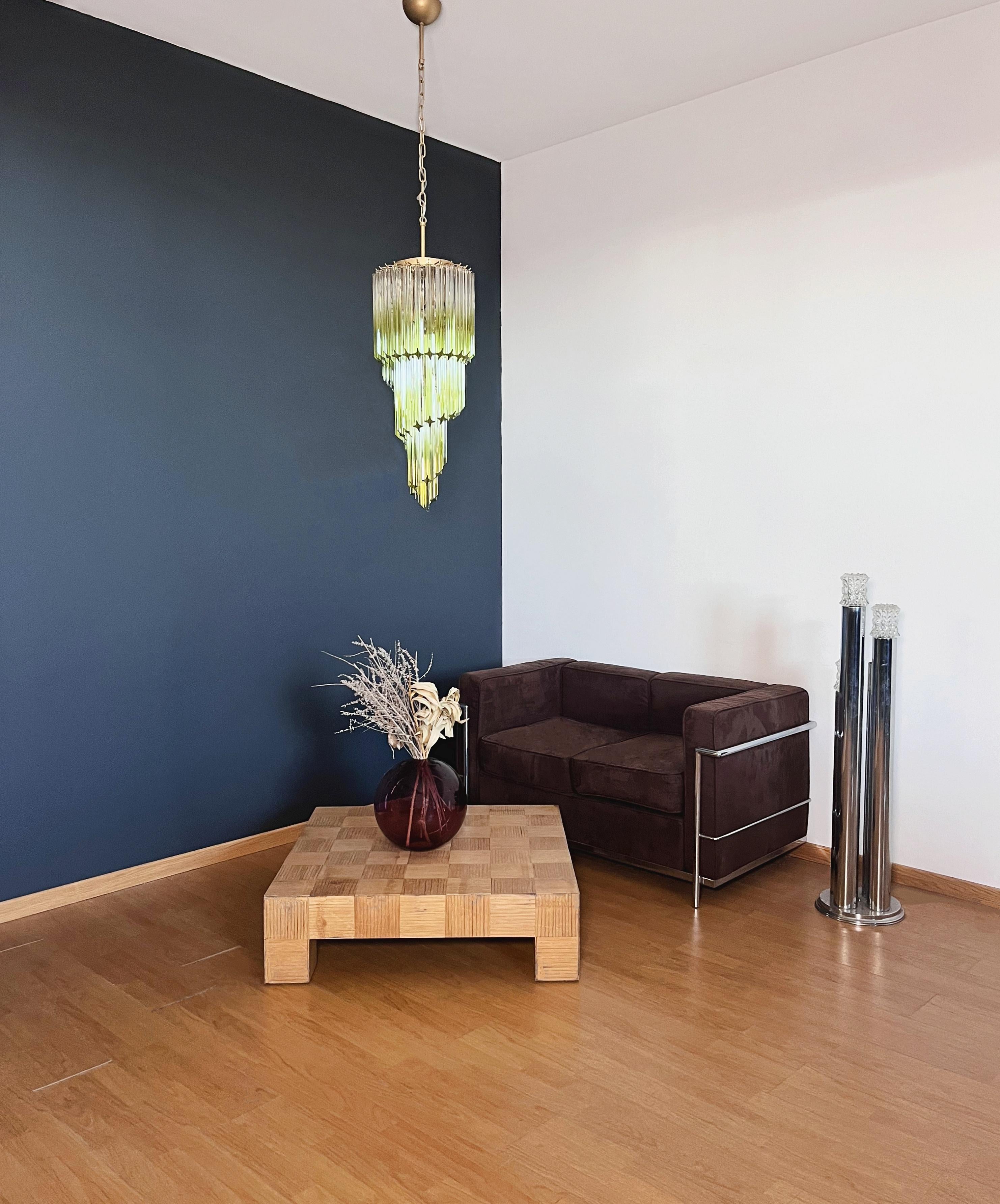 Fantastic Murano chandelier made by 54 Murano shaded green crystal prism (quadriedri) in a golde painted metal frame. The shape of this chandelier is spiral.
Period: late 20th century
Dimensions: 63 inches height (160 cm) with chain; 35.45 inches