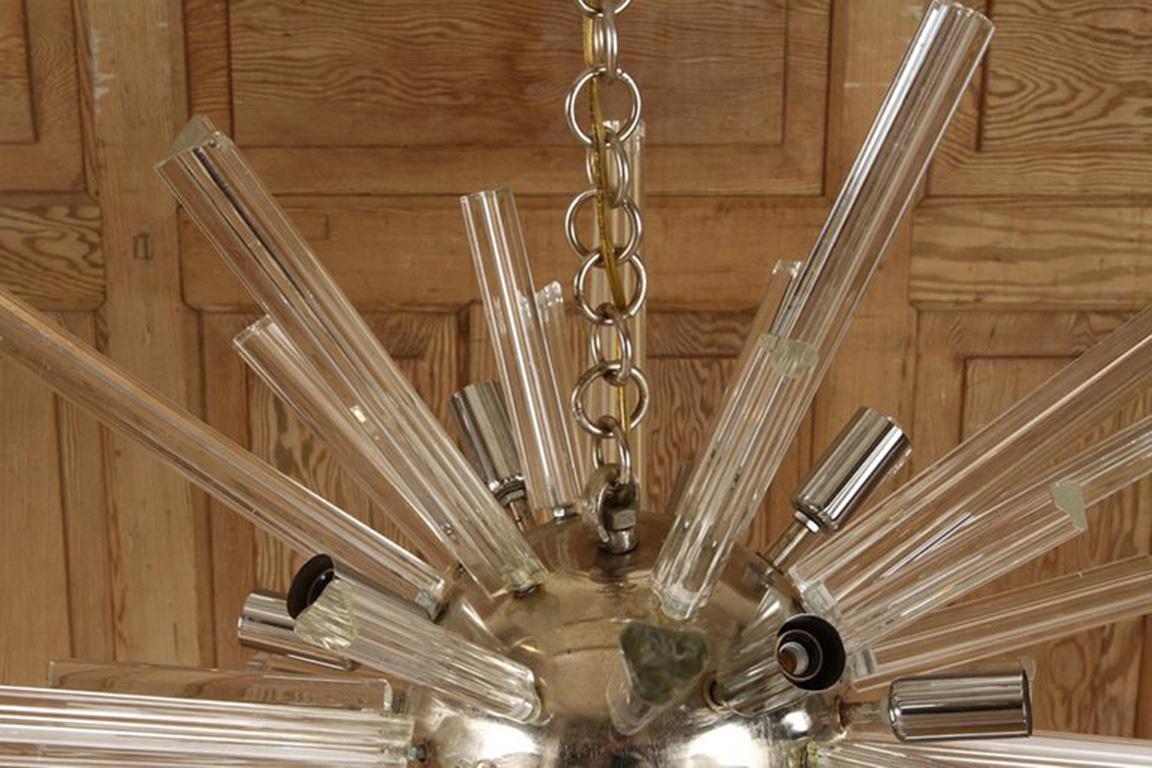 Murano glass Sputnik chandelier, Italian, circa 1960. Measures: Height 39, width 30.

The iconic Sputnik design was inspired by the first satellite to orbit the earth in 1957. This Soviet Union satellite was named “Sputnik” and was the size of a