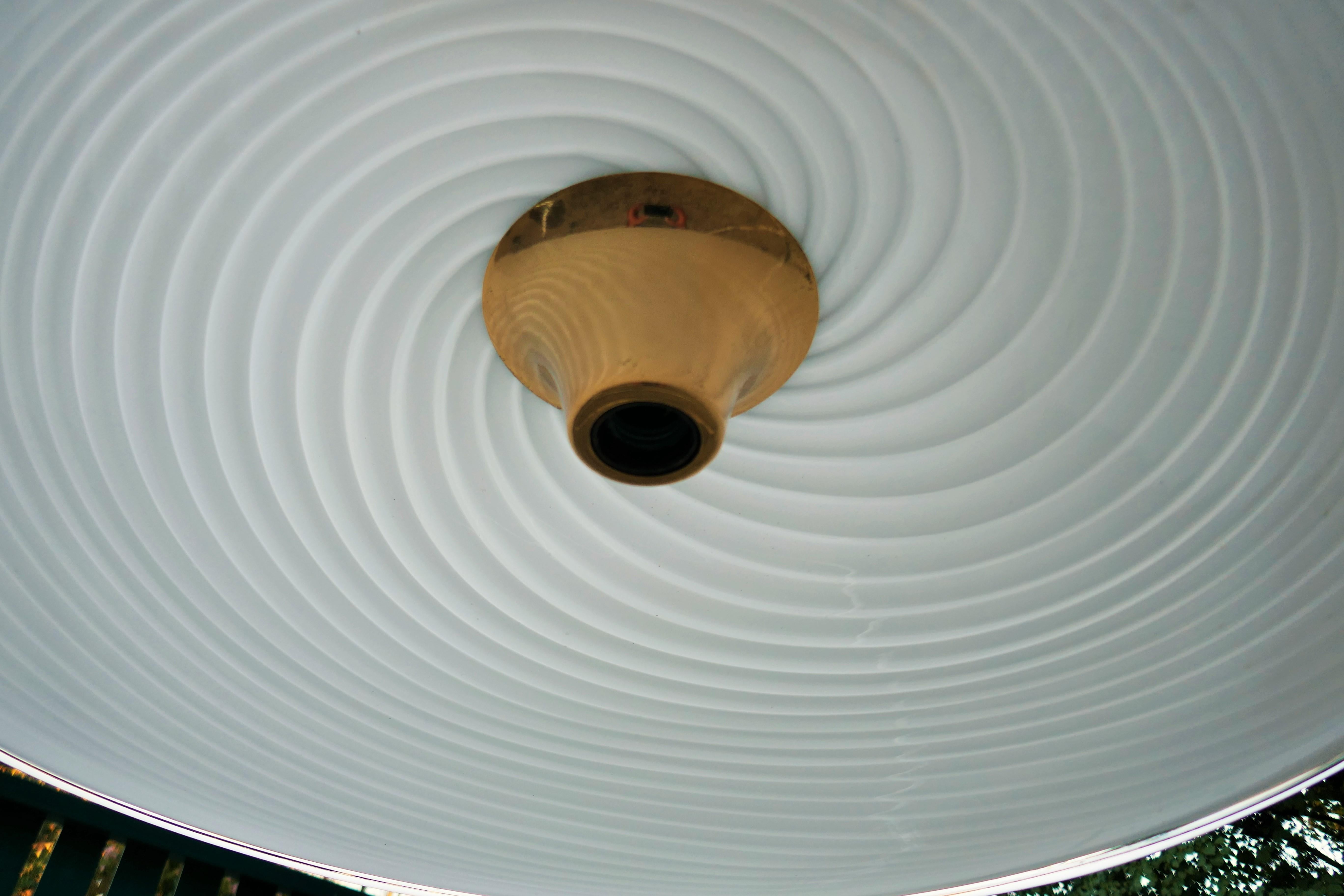 Late 20th Century Murano glass swirl pendant lamp. For Sale