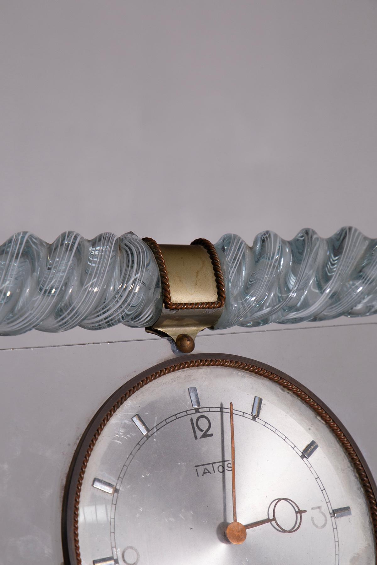 Discover the pinnacle of Italian craftsmanship with this stunning table clock from Barovier & Toso, designed by the celebrated Ercole Barovier. This exceptional piece showcases the artistry and elegance of mid-20th-century Murano glassmaking,