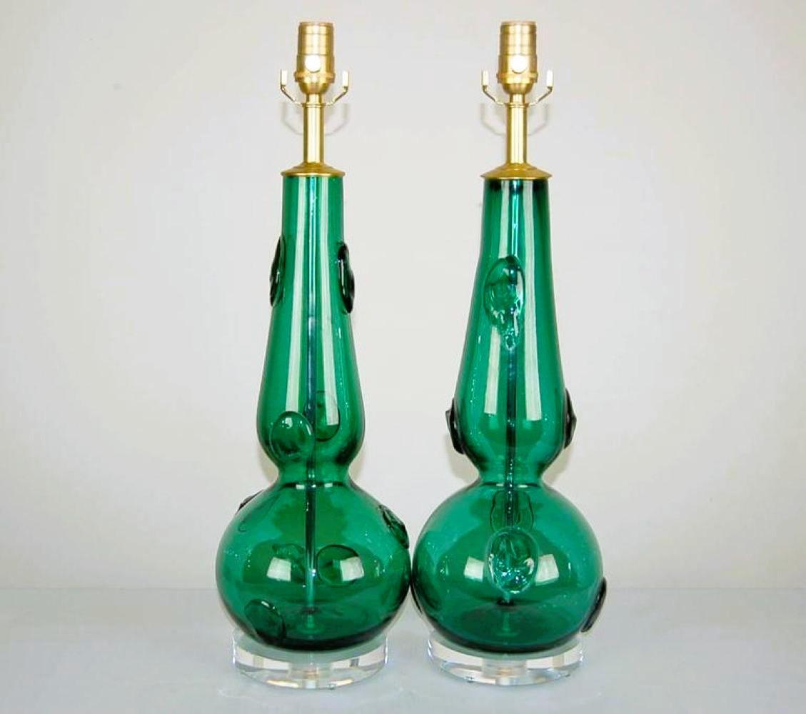 Spectacular JADE GREEN vintage Murano glass table lamps with an extra helping of applied glass prunts. Such a deep, rarely seen color and unique technique. 

The lamps stand 24 inches from tabletop to socket top.  As shown, the top of shade is 29