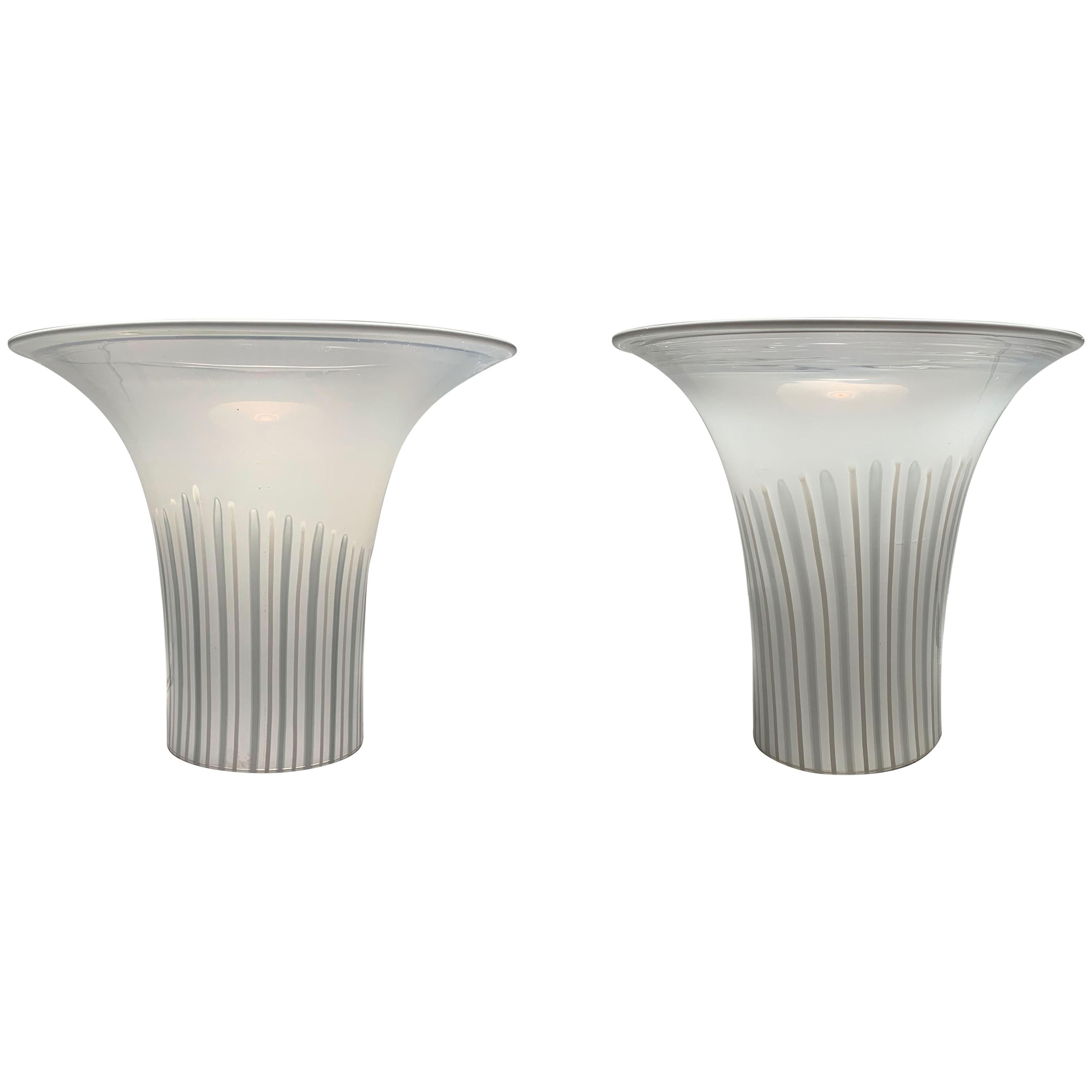 Murano glass tabletop torcheres. Soft illumination lamps for an interior. Italian glass lamps.

Possibly by Vistosi for Venini