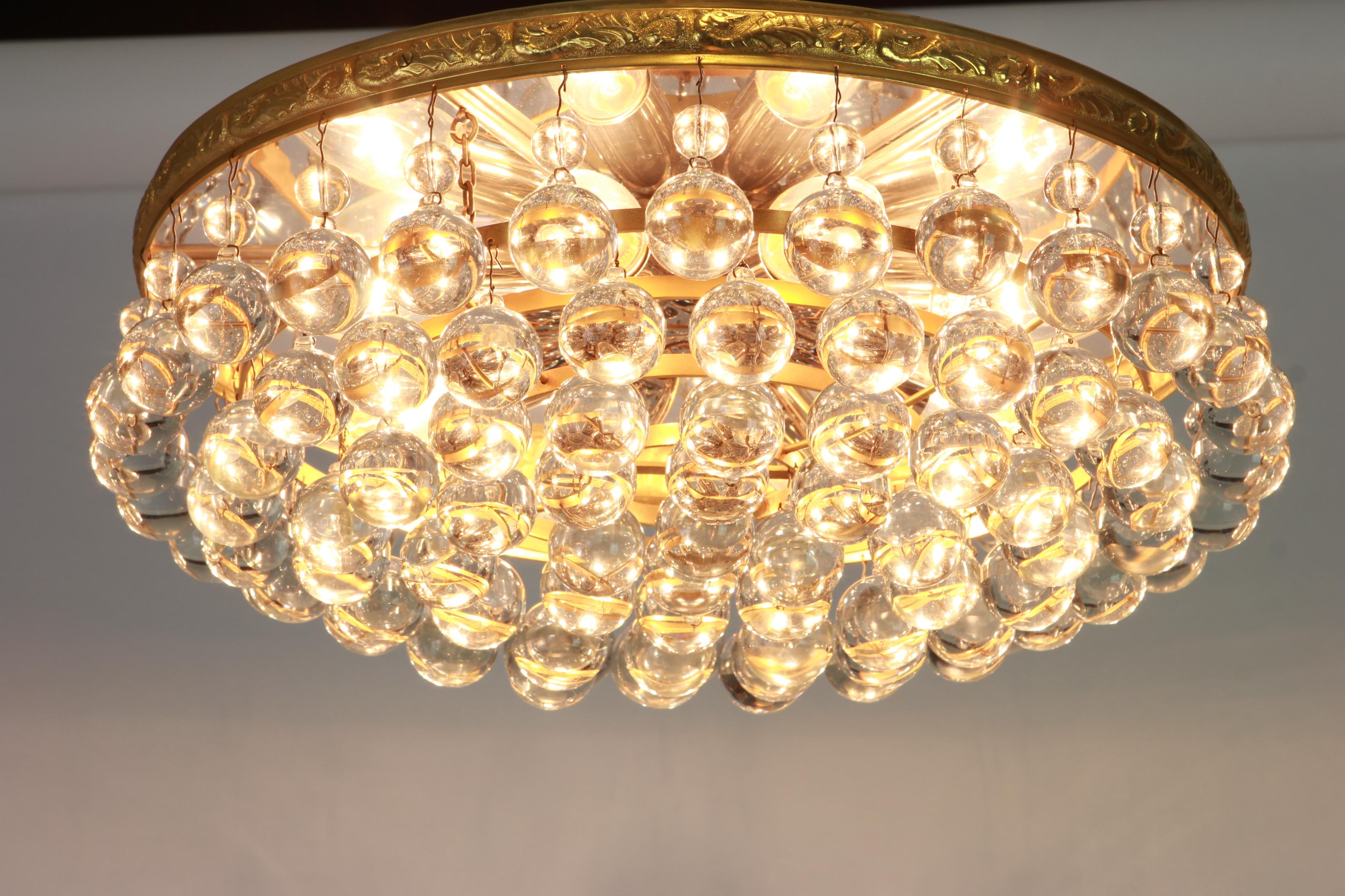 A stunning flushmount by Palwa (Palme and Walter), Germany, manufactured in 1970s. It’s composed of Murano drop glass pieces on brass frame.
High quality of materials.

Sockets: It needs eight x E14 base bulbs (max. 40 watt for each) to