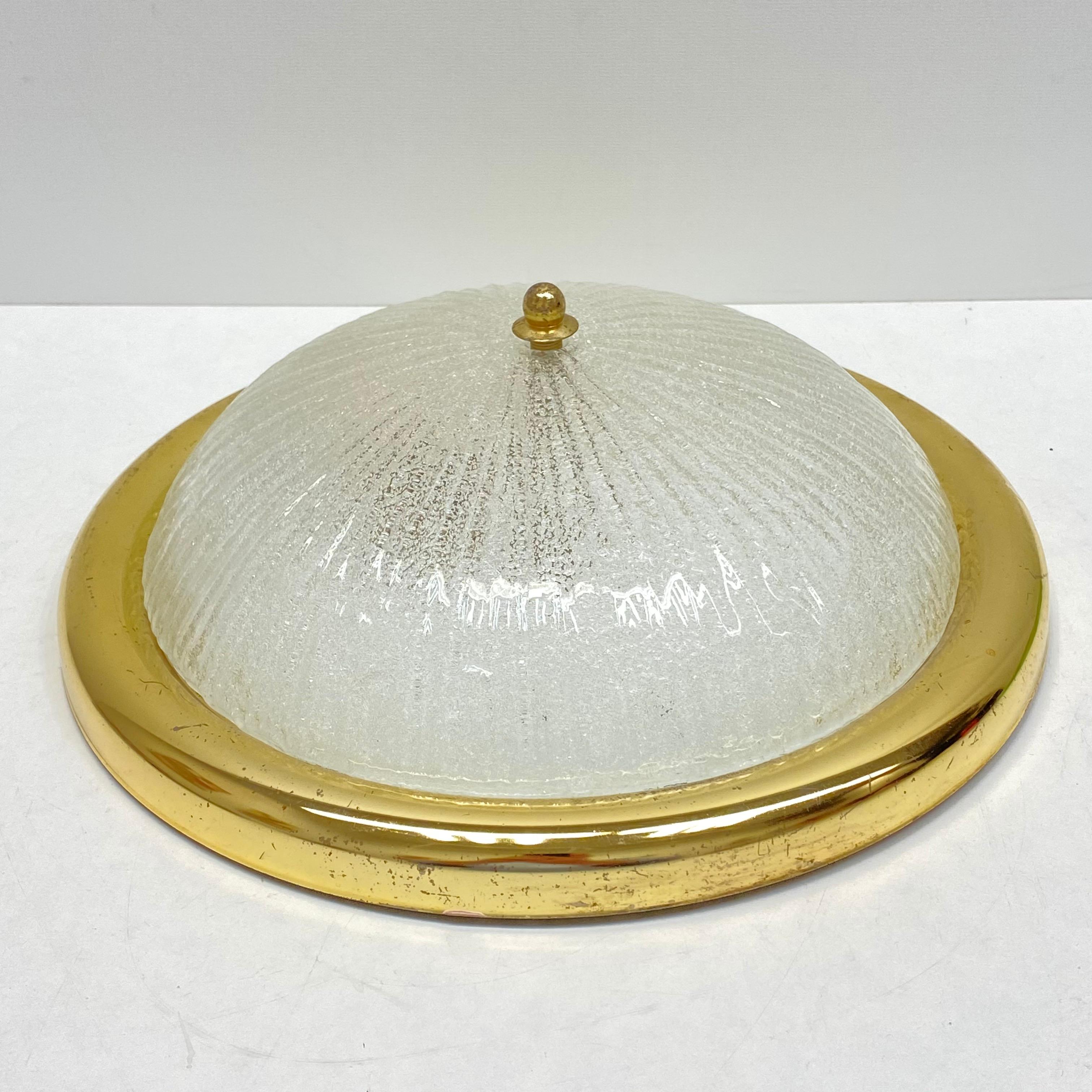 A brass and Murano glass flush mount by Fischer Leuchten. Very heavy Murano glass. The flush mount requires one European E27 Edison bulb, up to 60 watts.