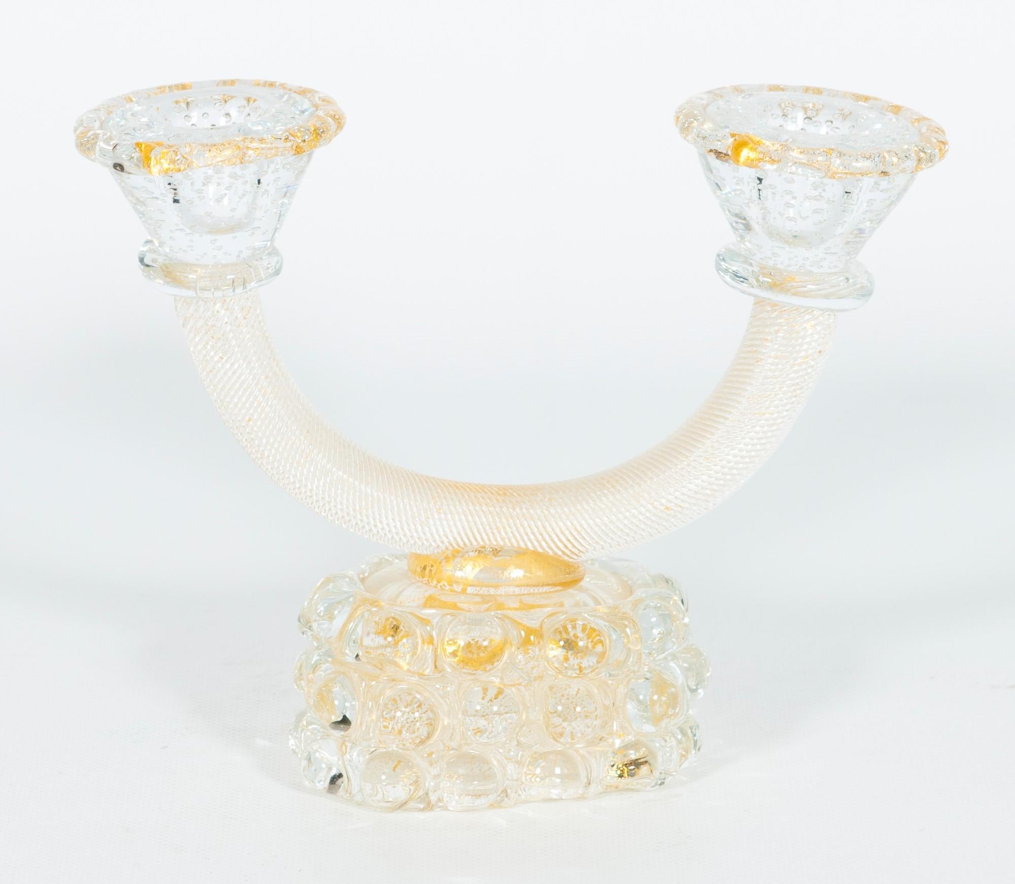 Murano glass Torciglione candle holder with submerged gold attributed to Seguso.
This is a very special artistic candle holder, a masterpiece attributed made by the renowned Murano glassmaker Seguso. 
The 