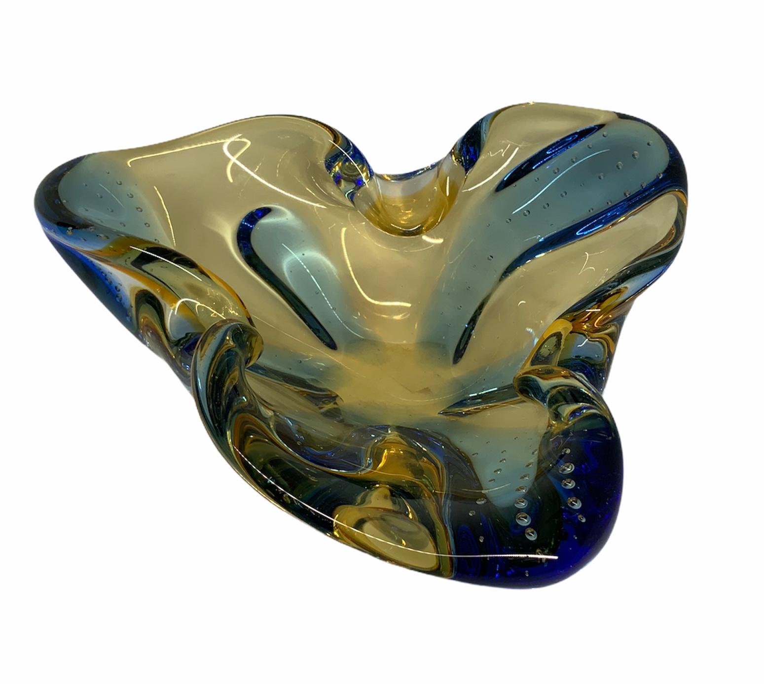 This is a royal blue and yellow color trifoil folded rim bowl.